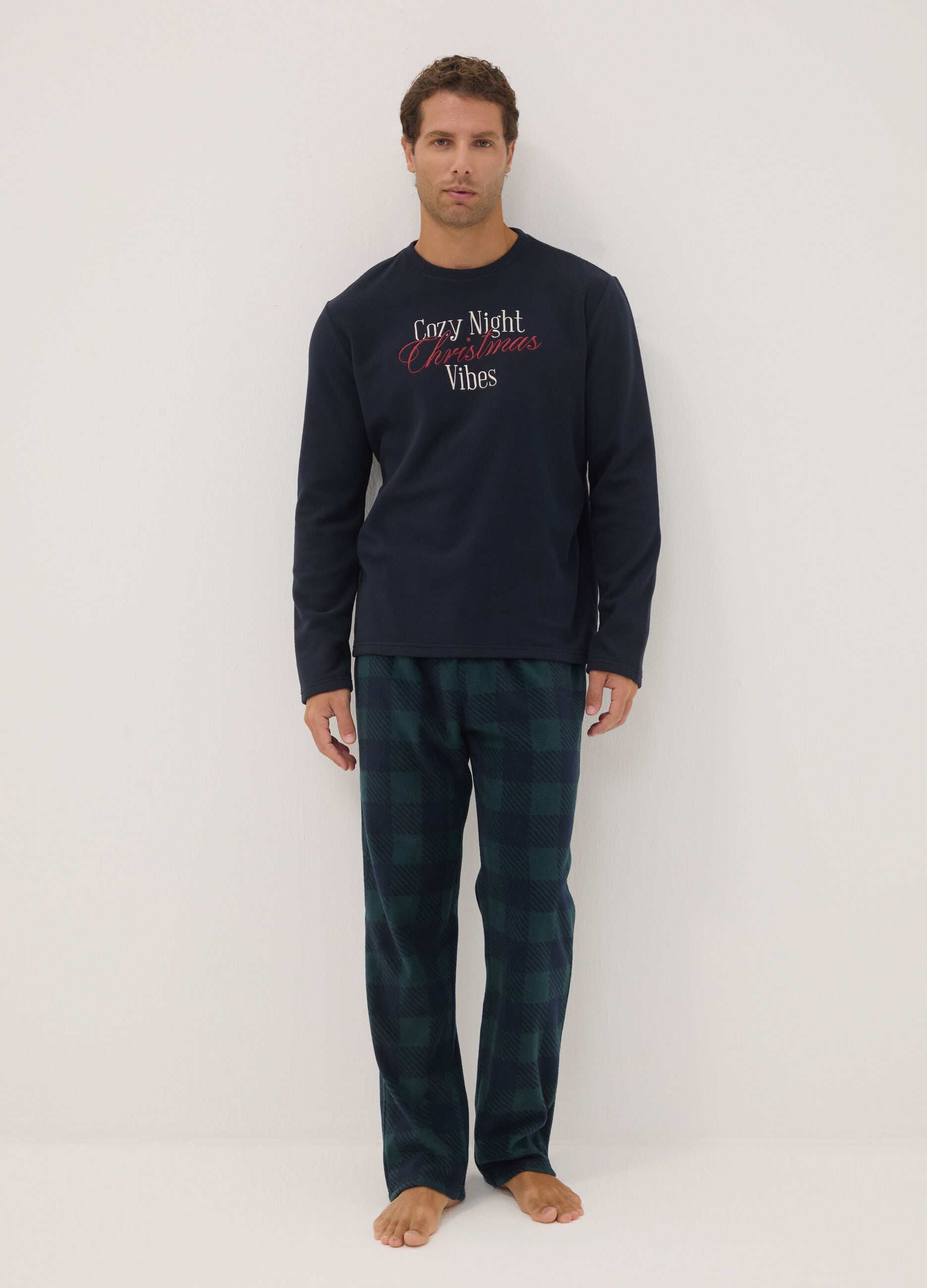Navy blue long pyjamas with crew neck top and check trousers
