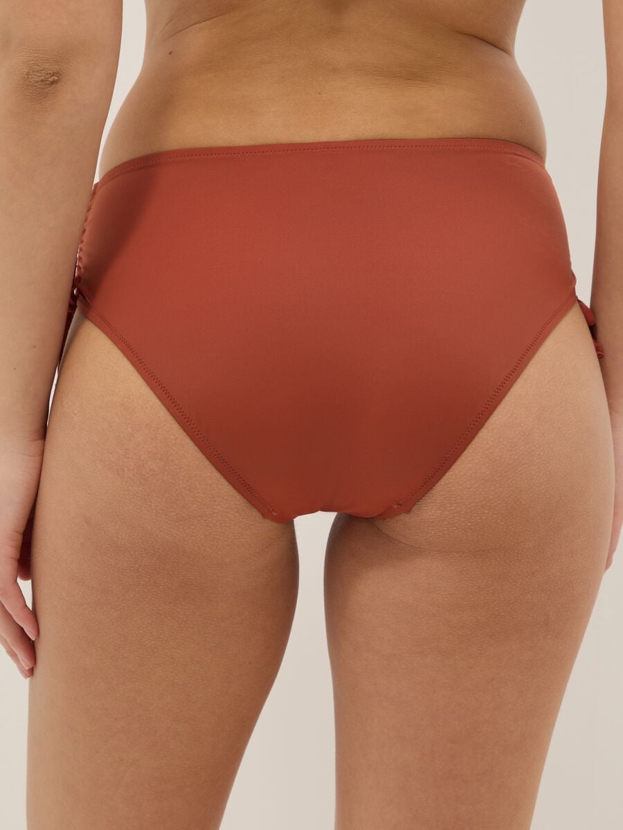 Orange stretch bikini bottoms with ruched side detailing_2