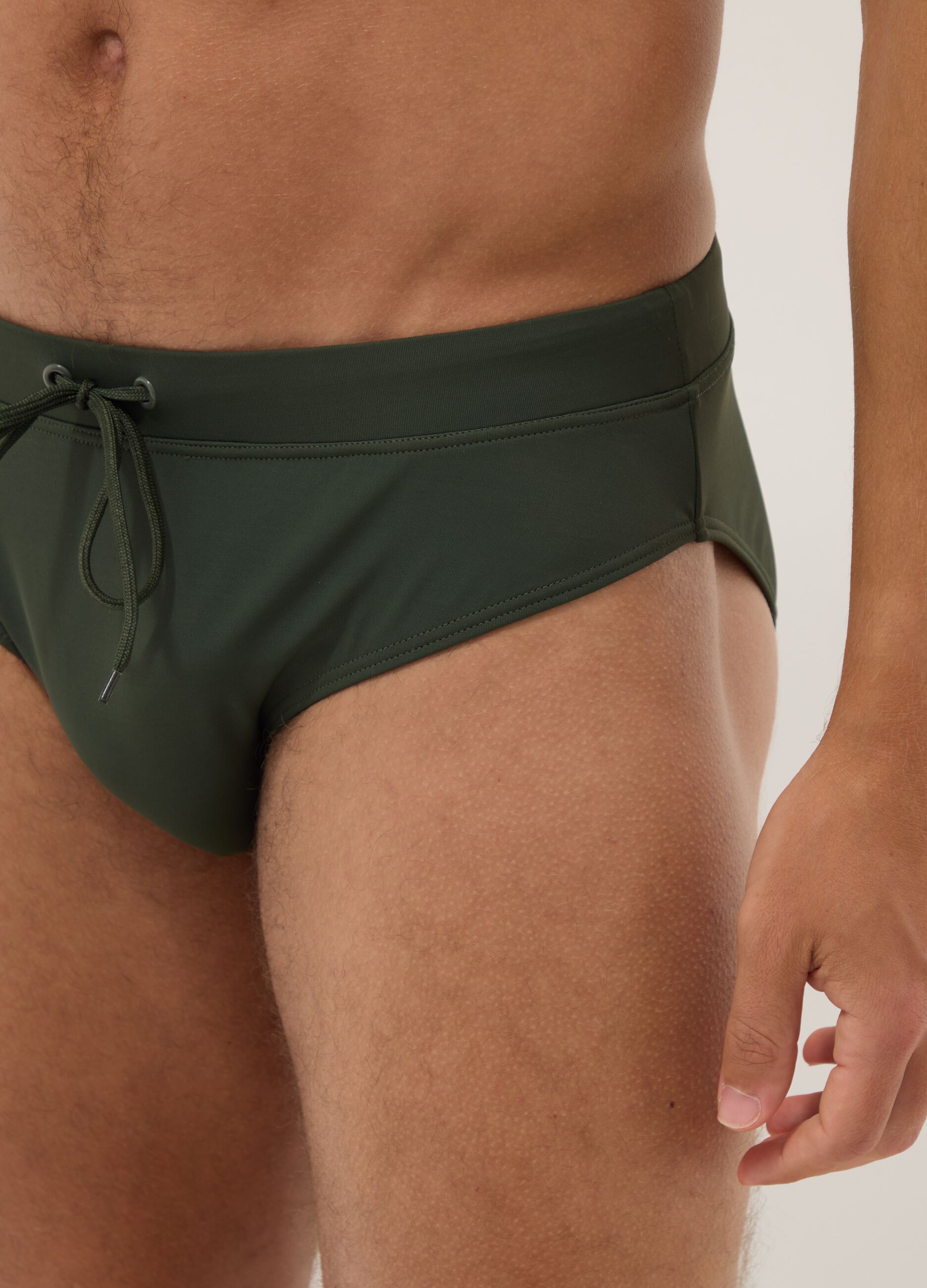 Green stretch fabric swim briefs