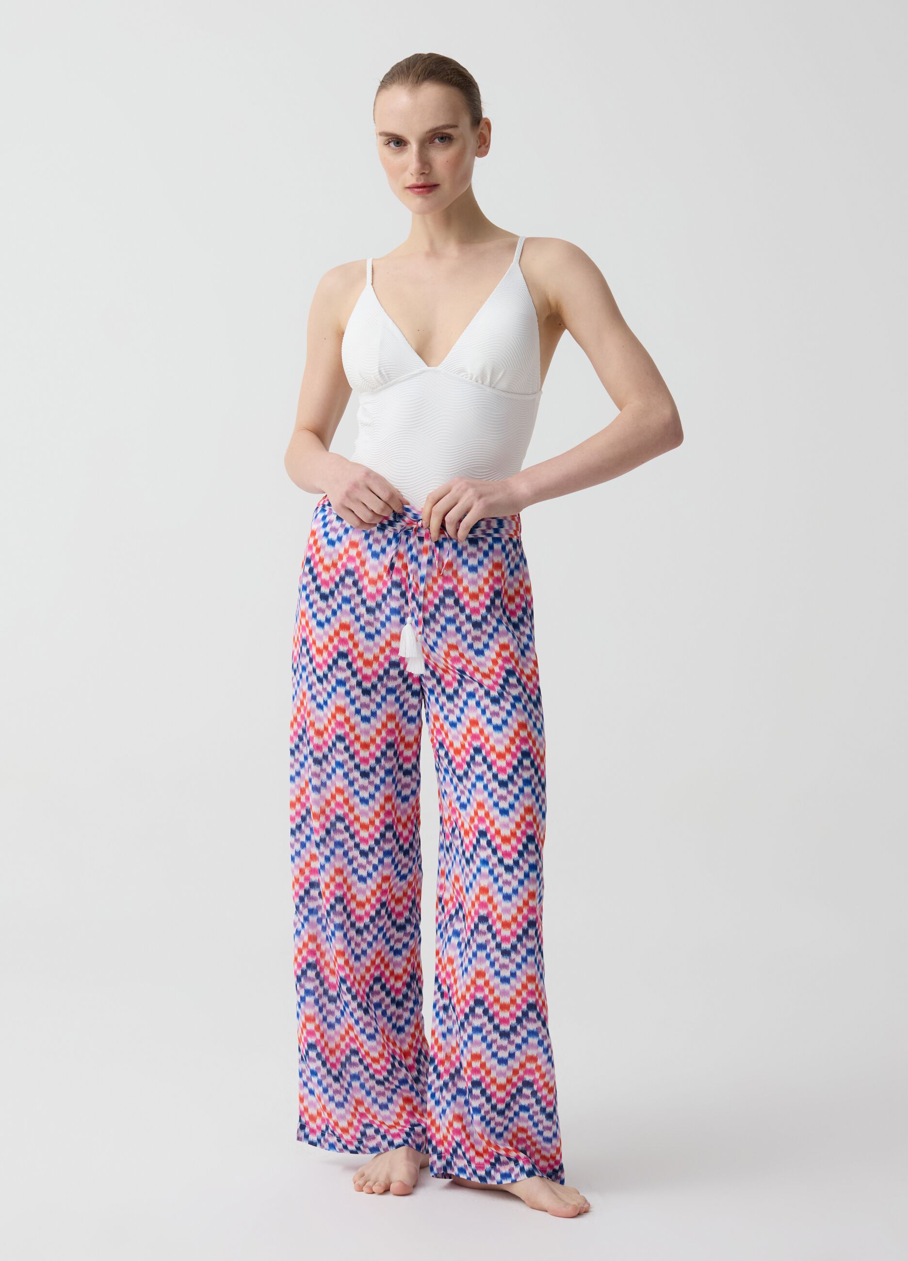 Beach cover-up trousers with pixel print