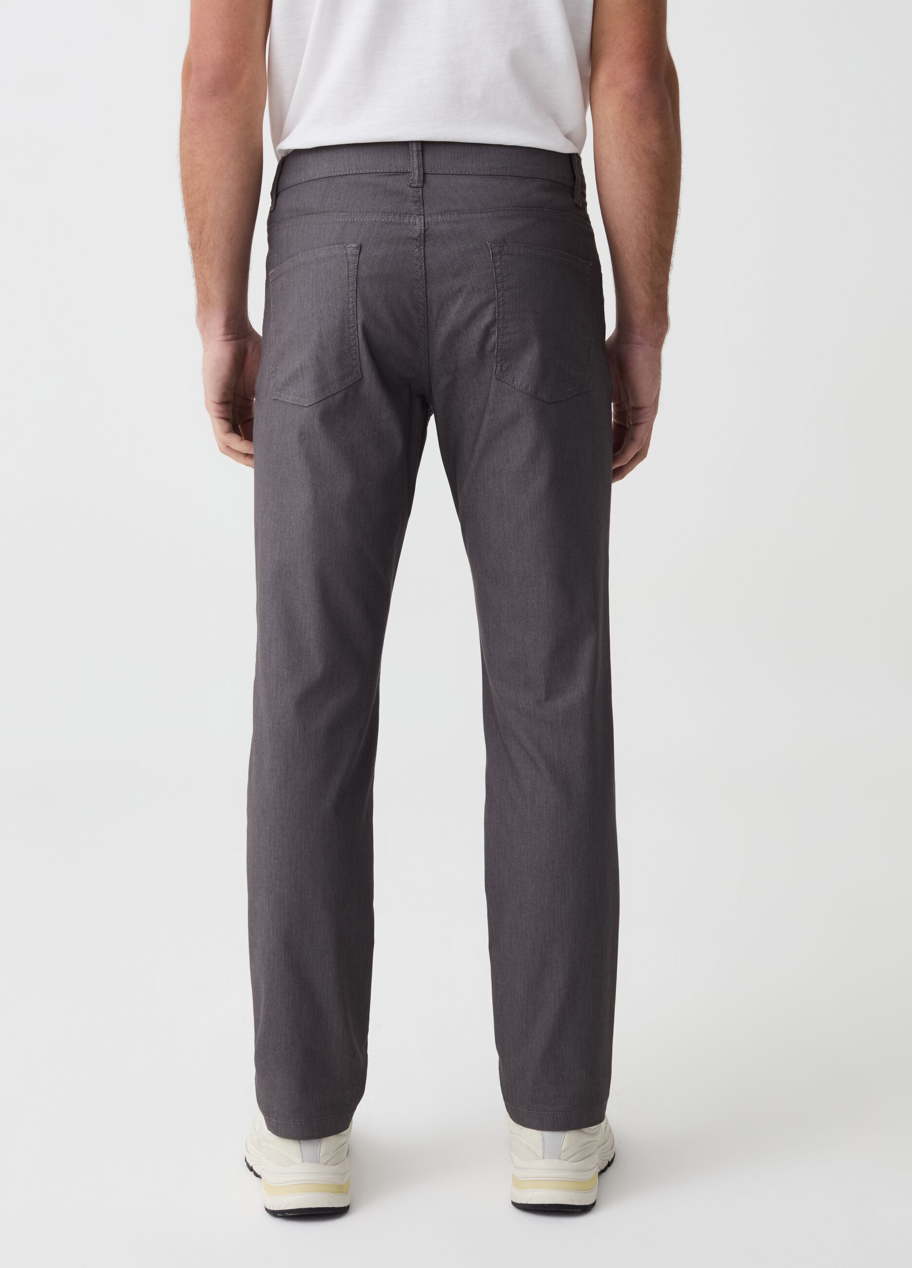 Slim-fit trousers with thin stripes