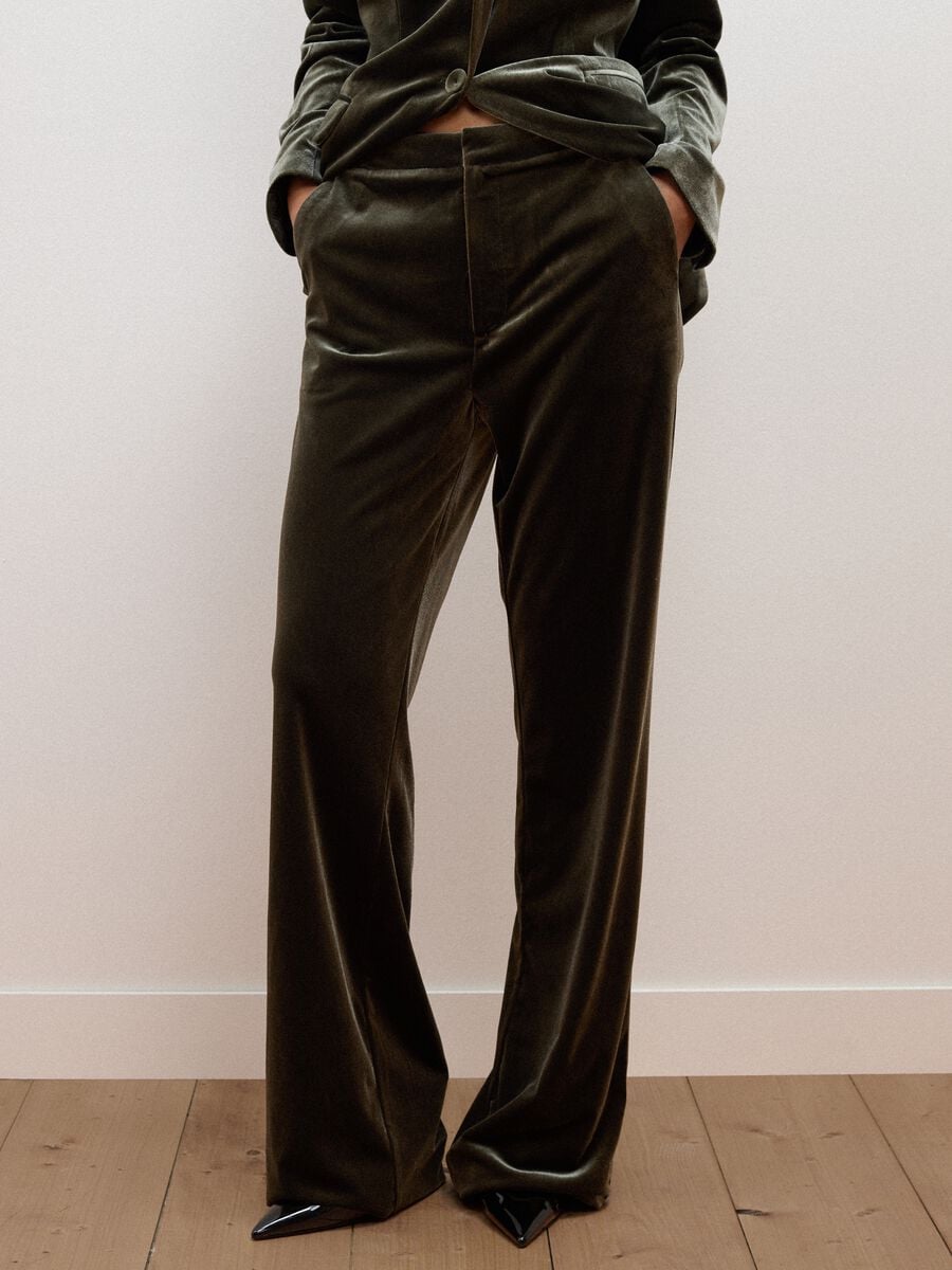 Pantaloni verdi in tessuto elasticizzato flare fit_1