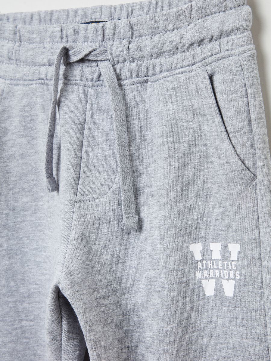 Plush joggers with drawstring and print_1