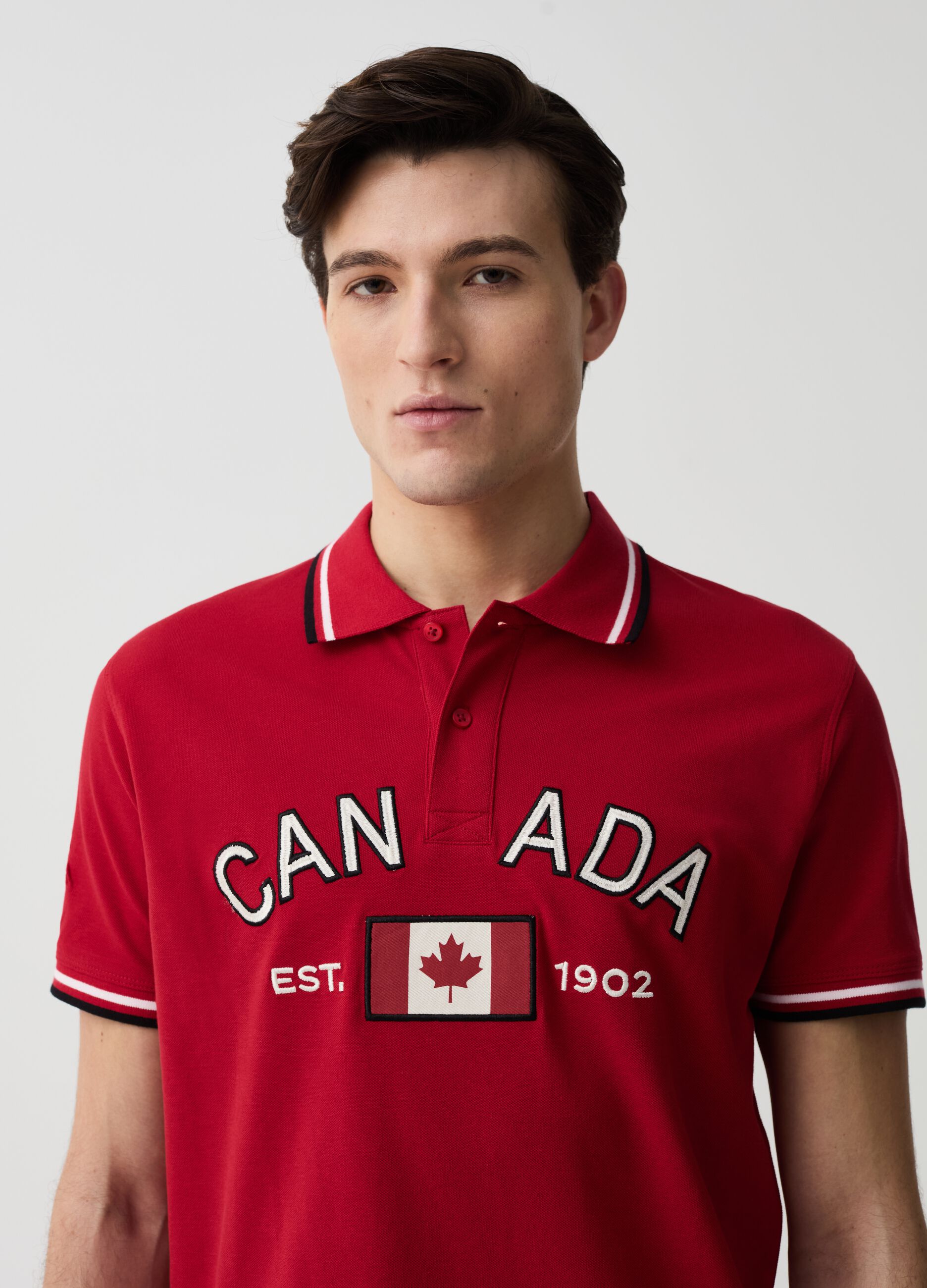 Polo shirt with striped edging and Canada Trail embroidery