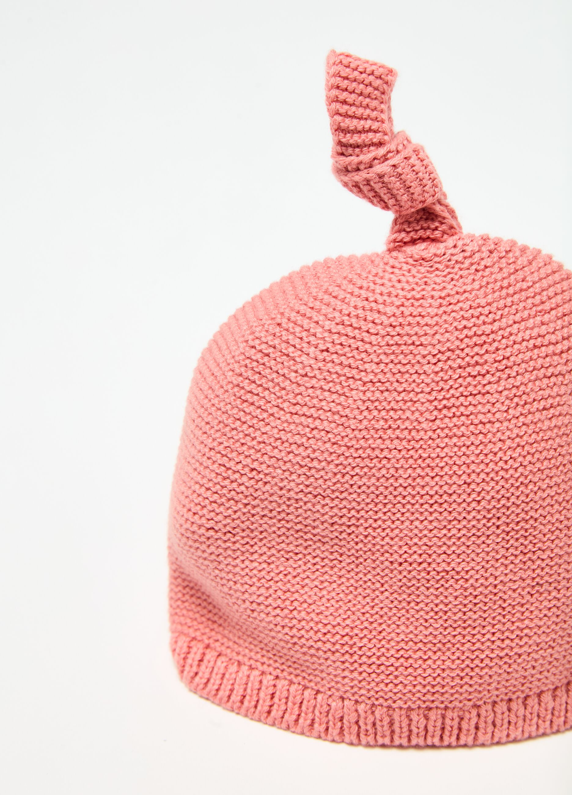Knitted hat with knot