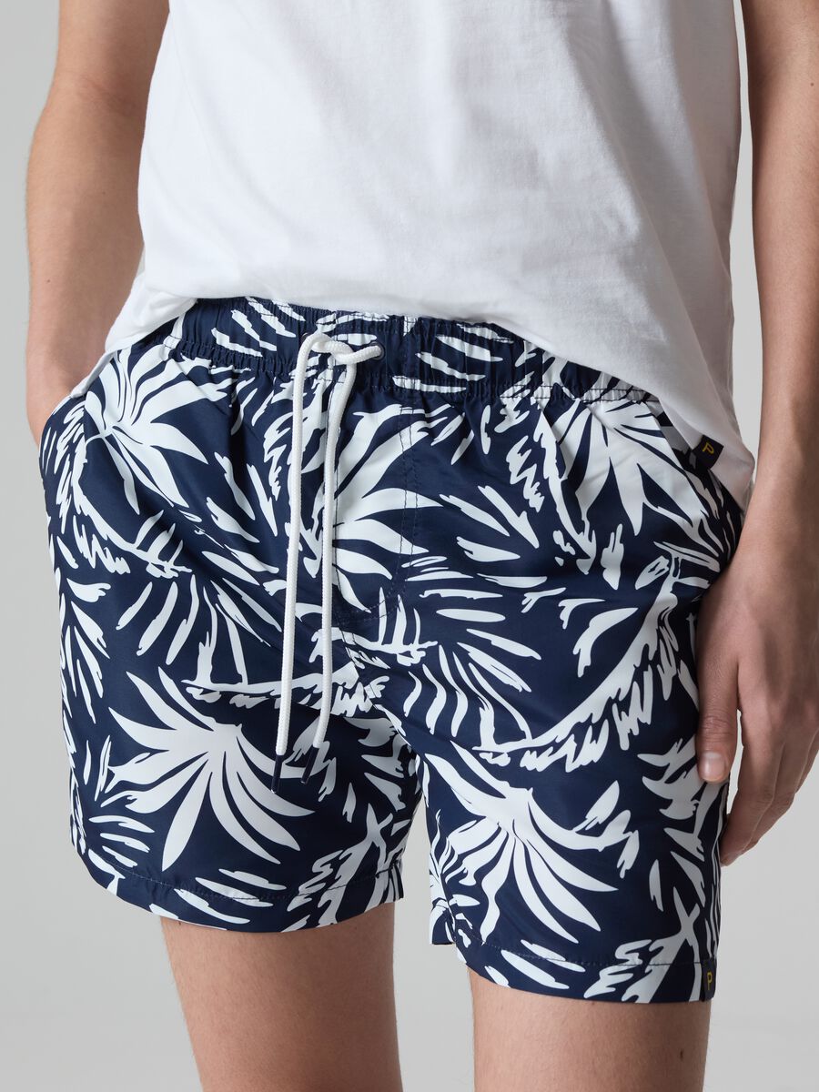 Bermuda swim shorts with foliage print_1