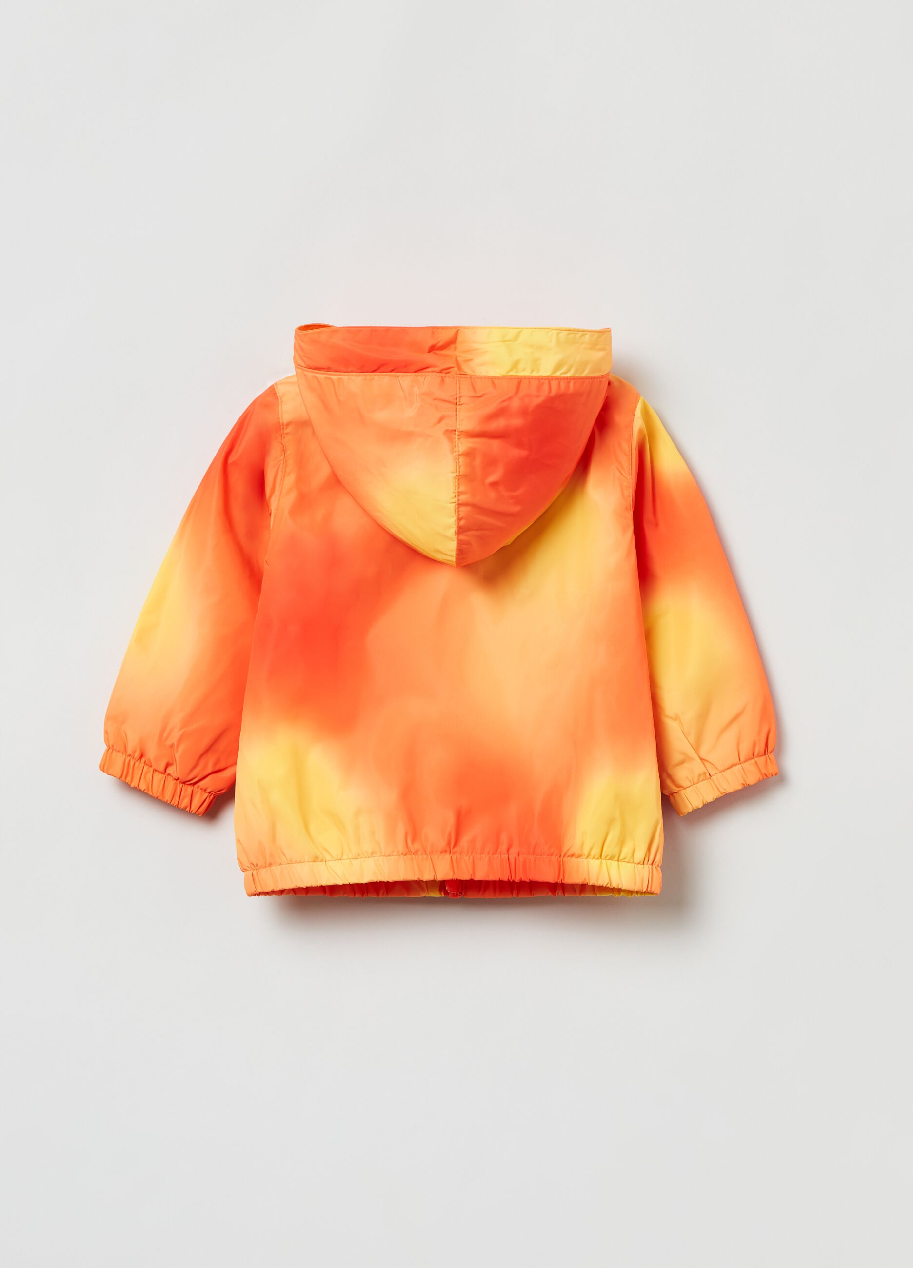 Waterproof jacket in tie dye pattern.