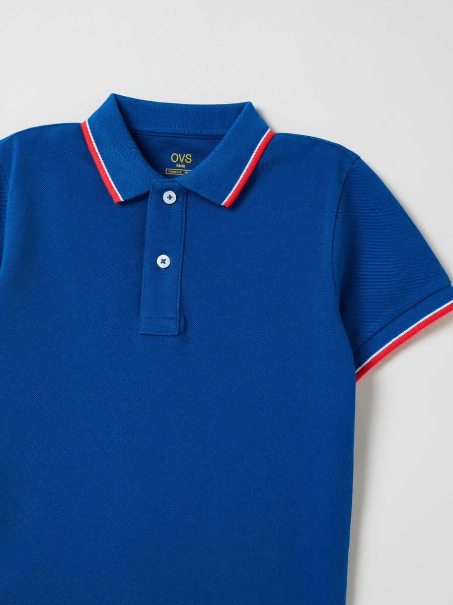 Polo shirt in piquet with striped trim_1