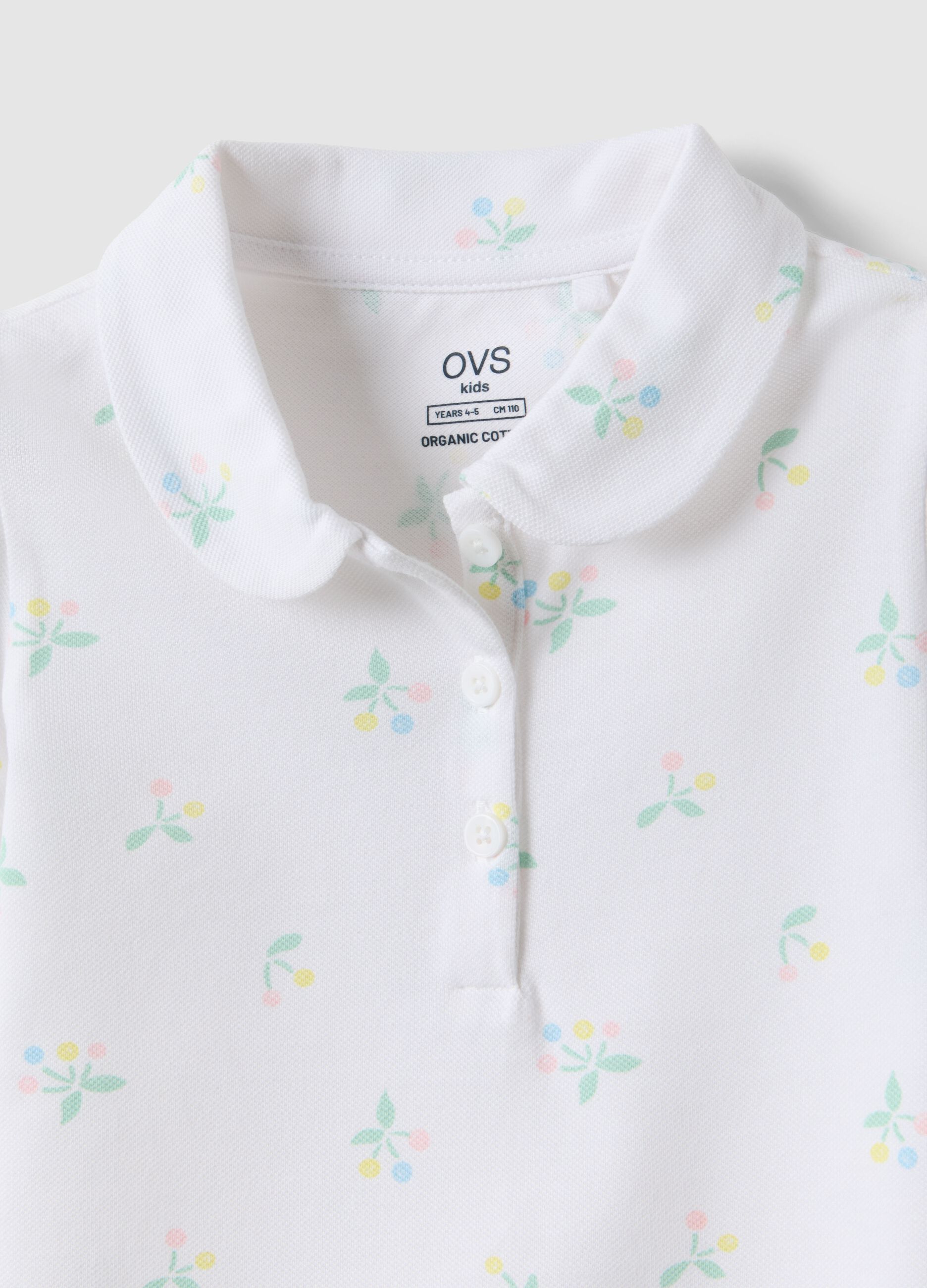 Girls' white cotton polo regular fit with floral pattern