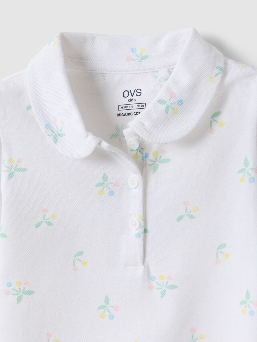 Girls' white cotton polo regular fit with floral pattern_3