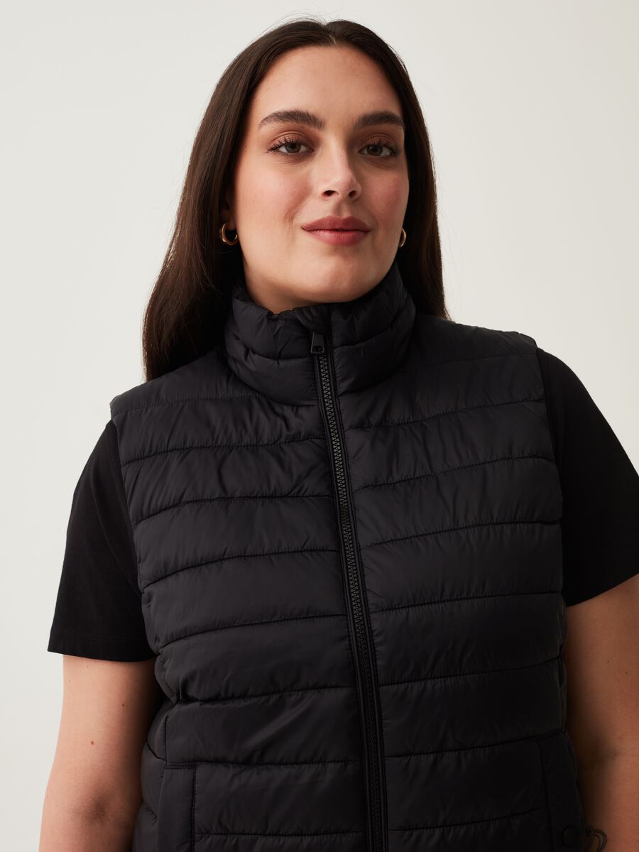 Curvy ultralight gilet with high neck_1
