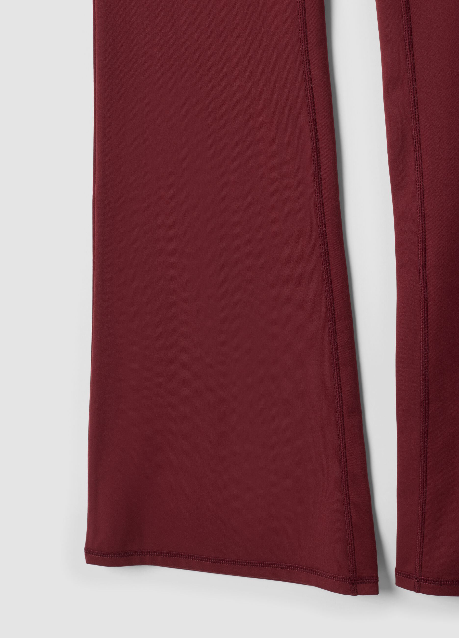 Red flared leggings in stretch fabric
