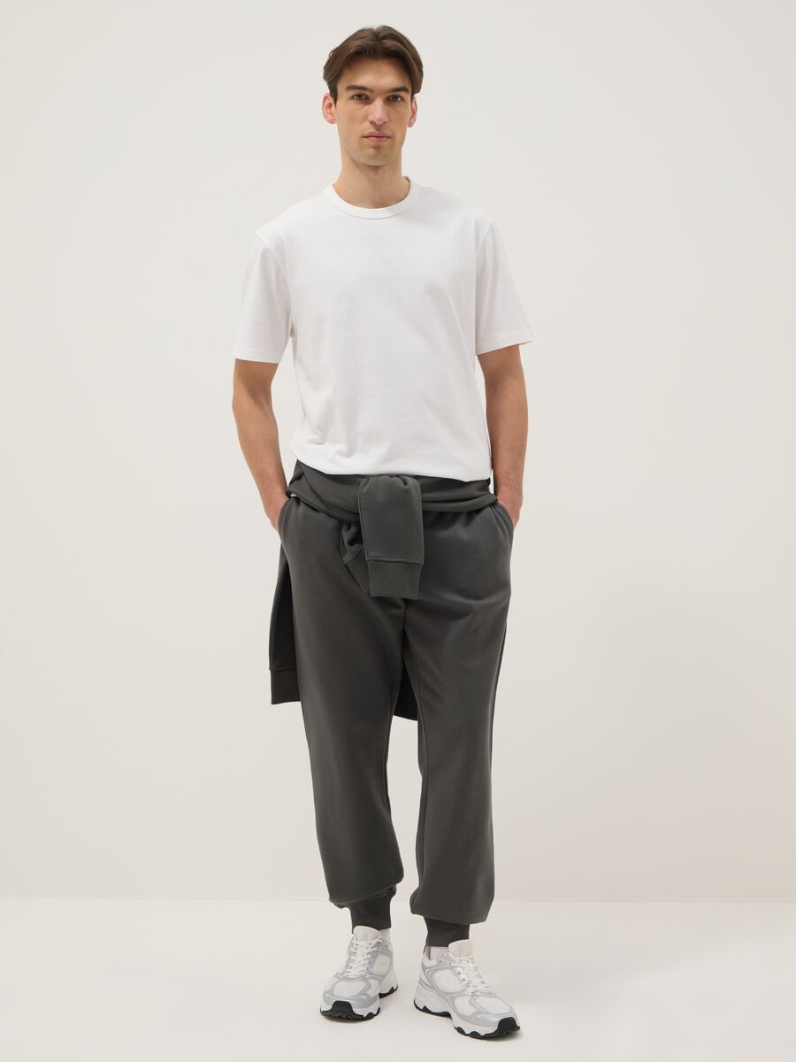 T-shirt in puro cotone bianca relaxed fit con girocollo rifinito_1