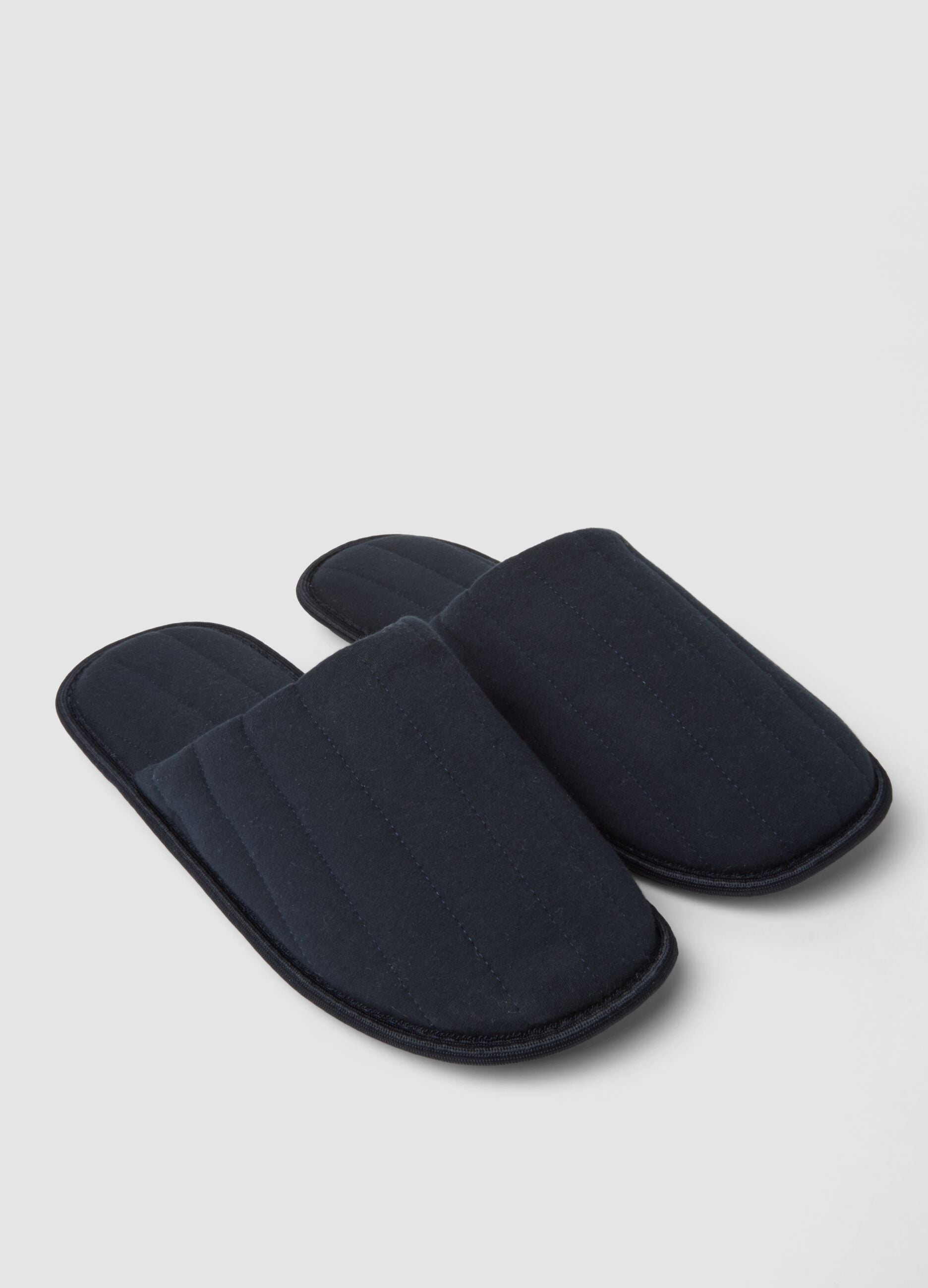 Padded blue slippers for home