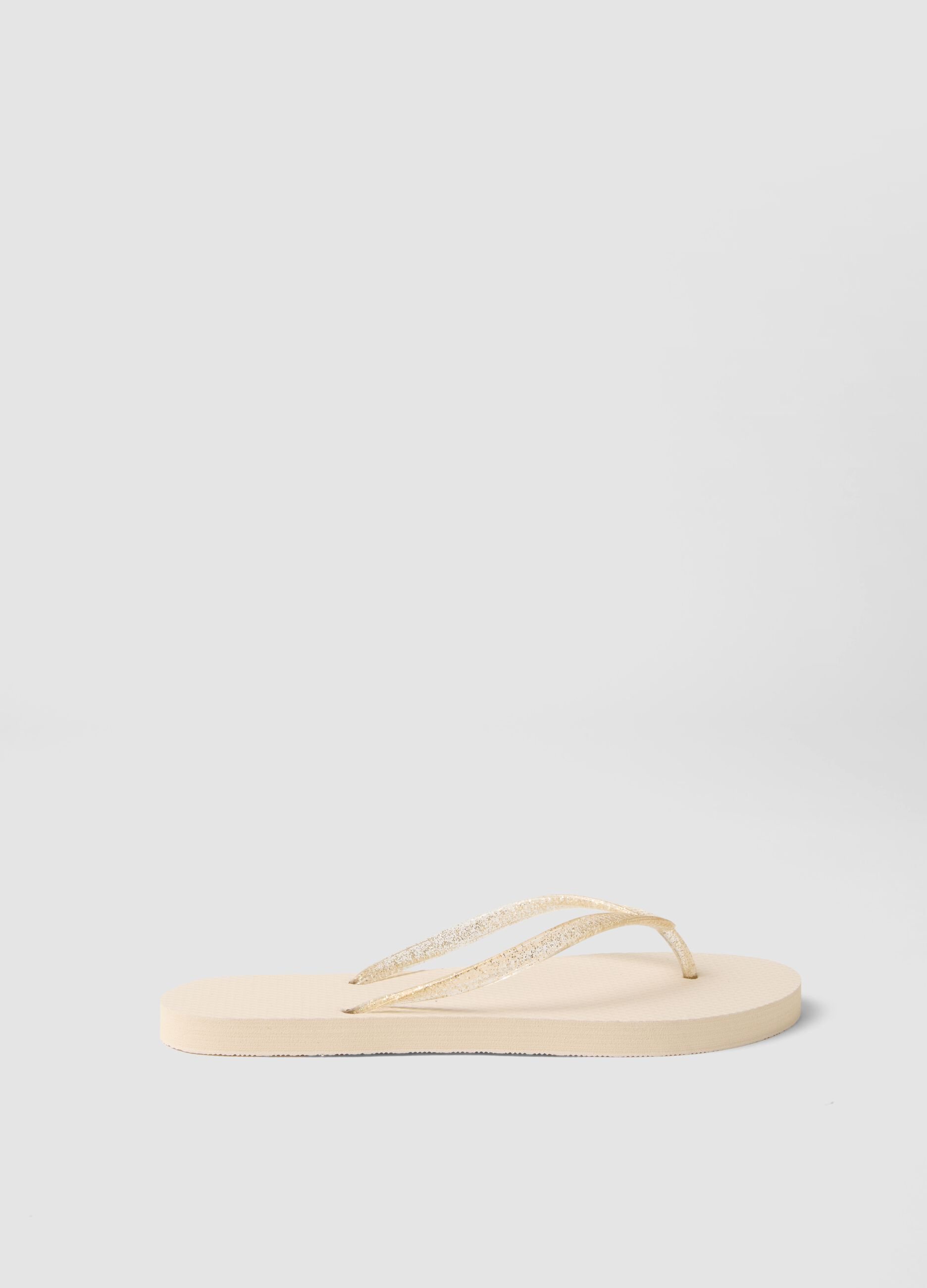 Beige Zehentrenner mit transparenten Riemchen