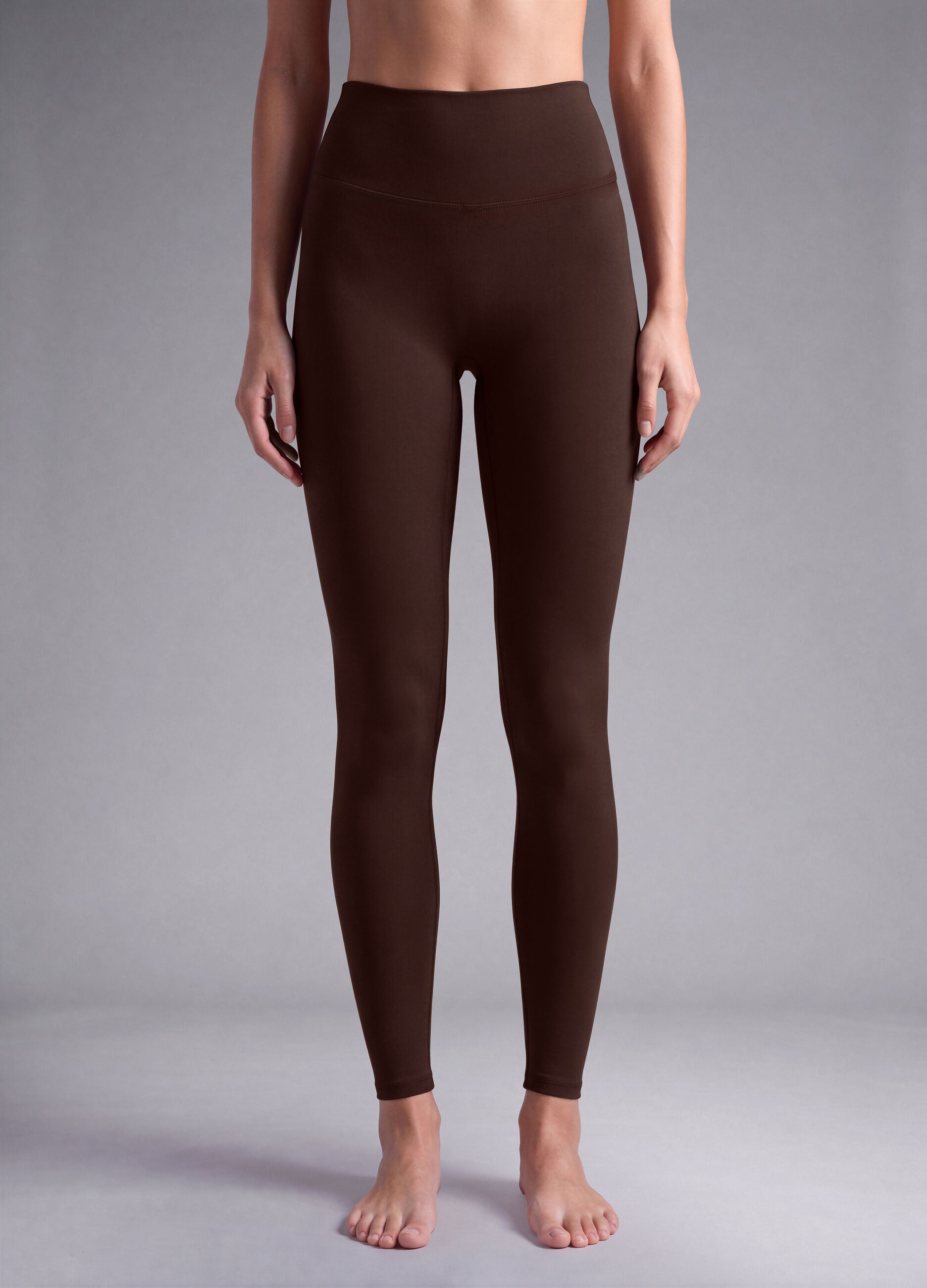 Brown high-waisted stretch leggings