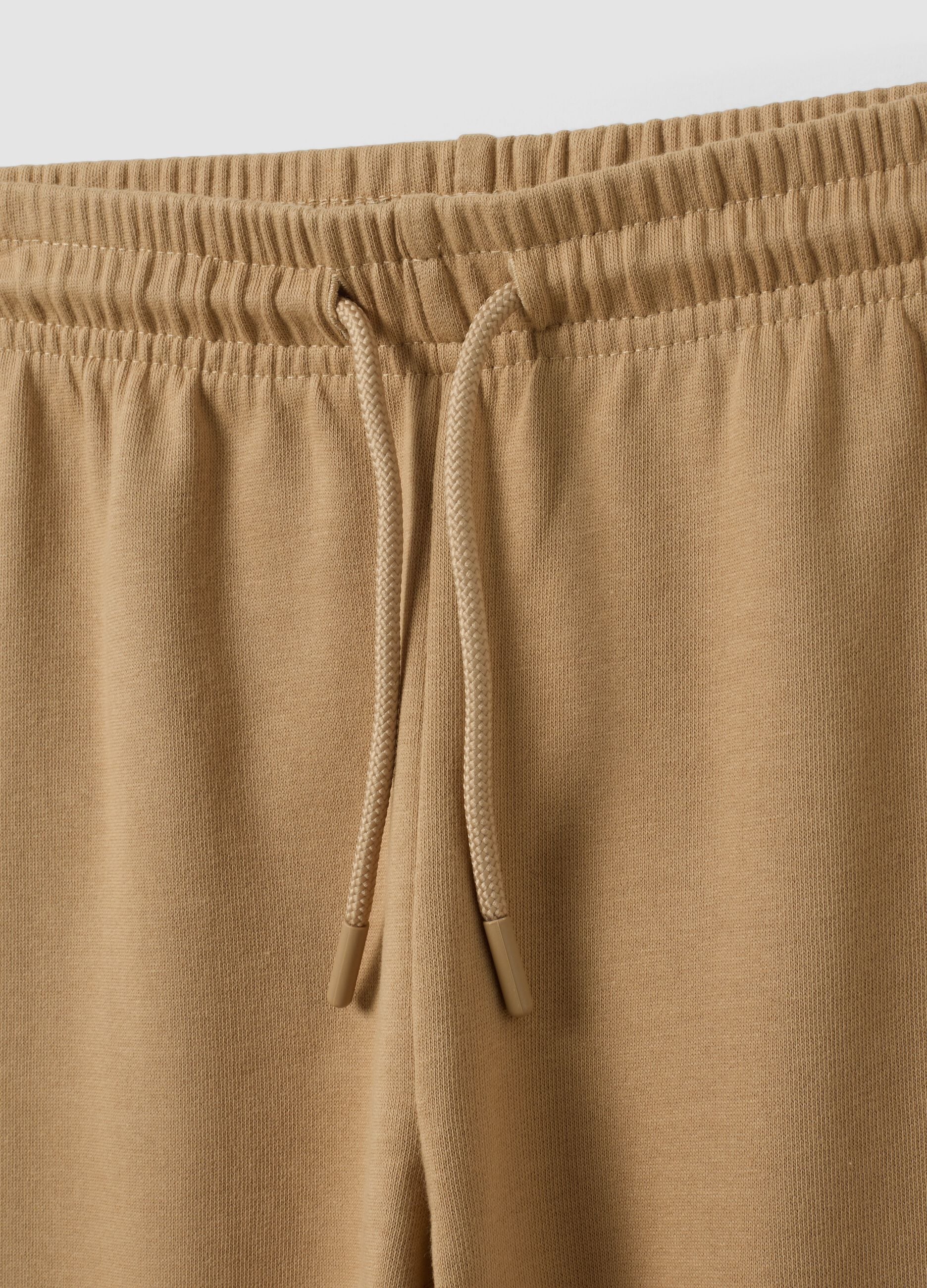 Beige regular-fit joggers in pure organic cotton for boys