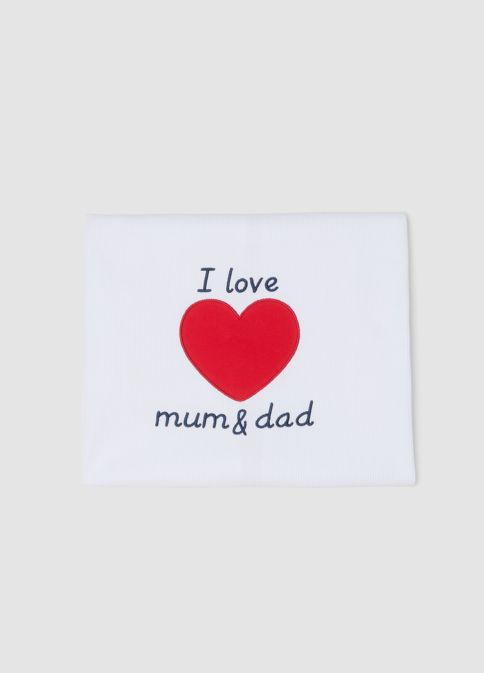 White 100% cotton baby blanket with red heart