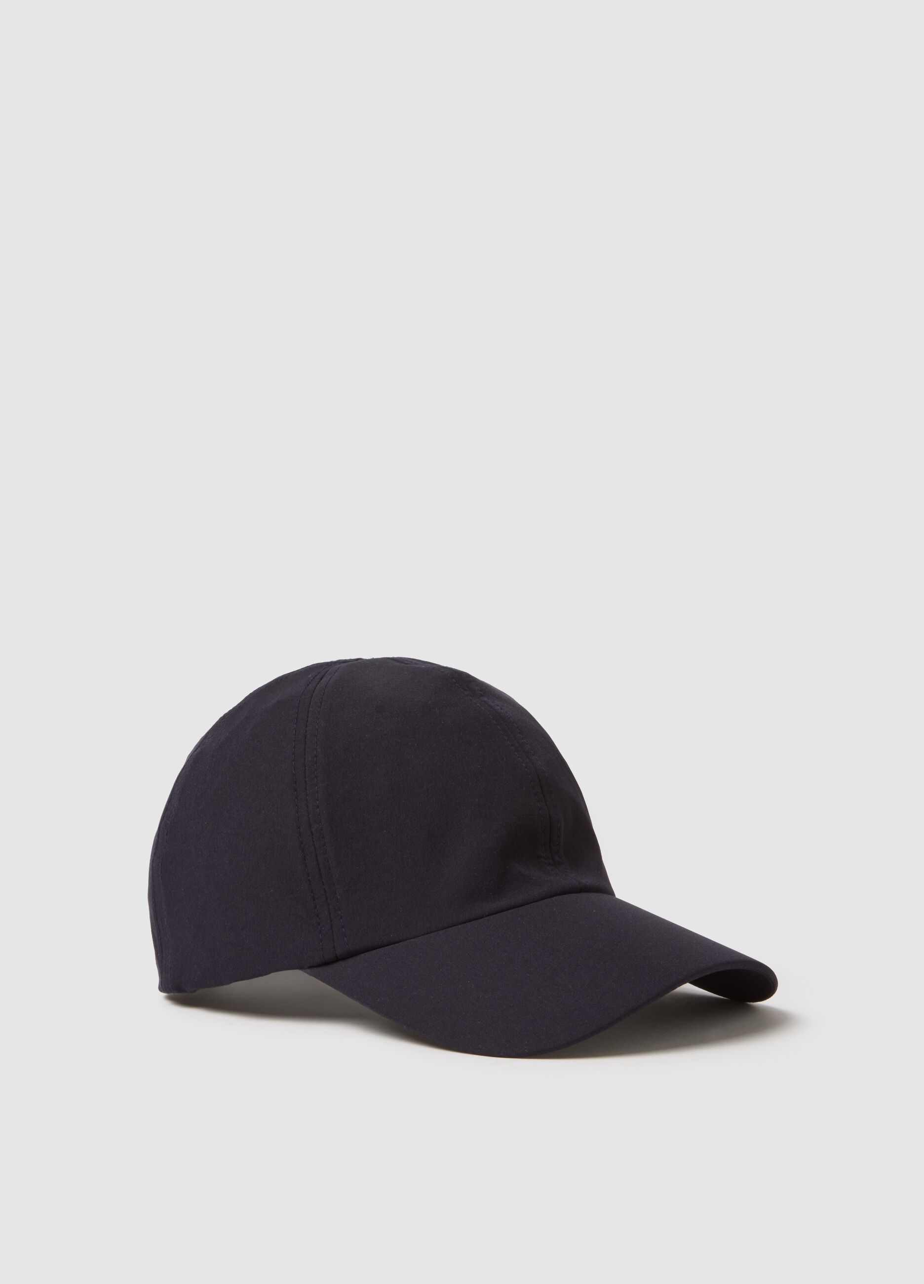 Blue cap with adjustable visor