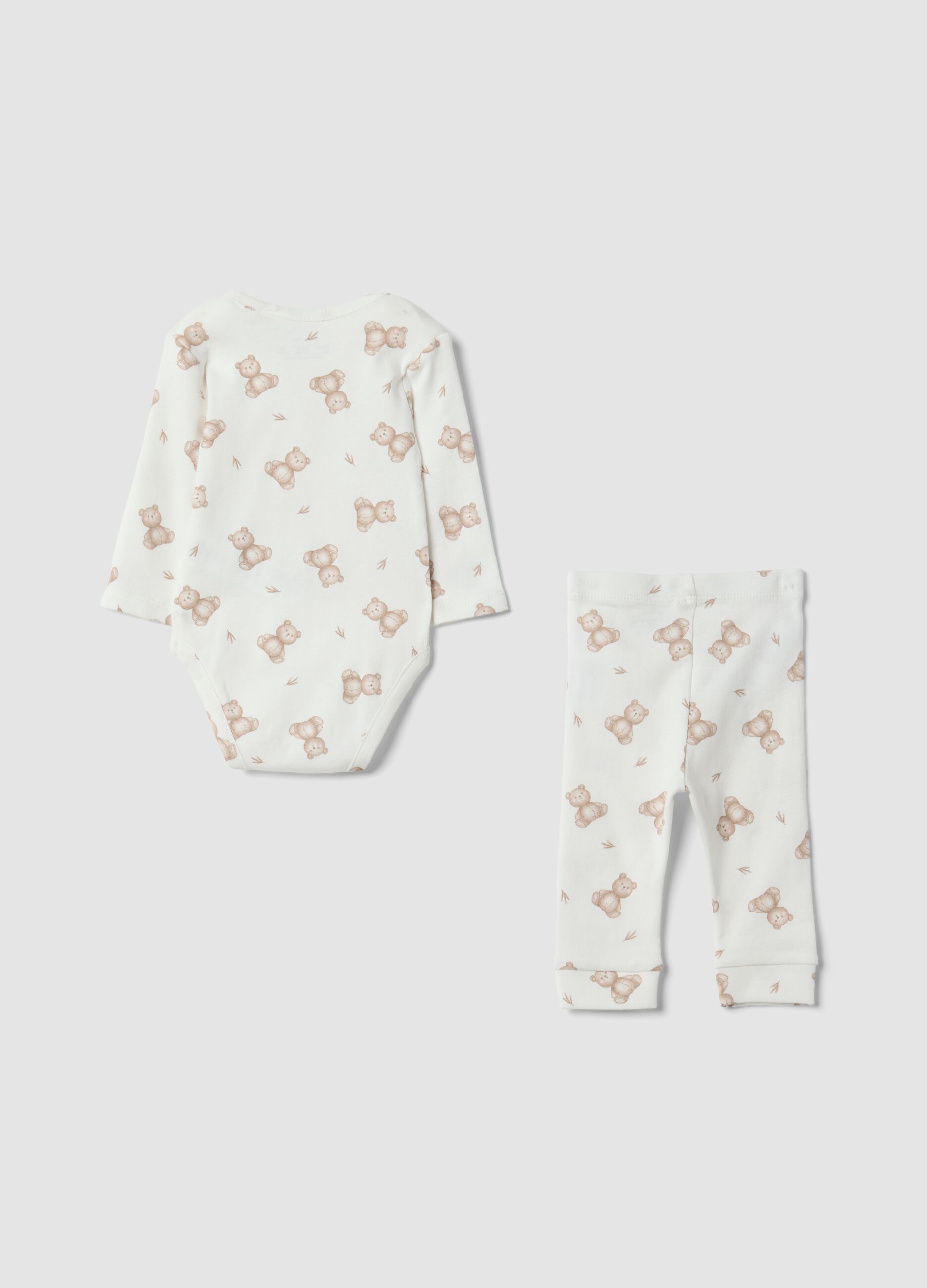 Set bianco in puro cotone organico con body e leggings stampati per neonati