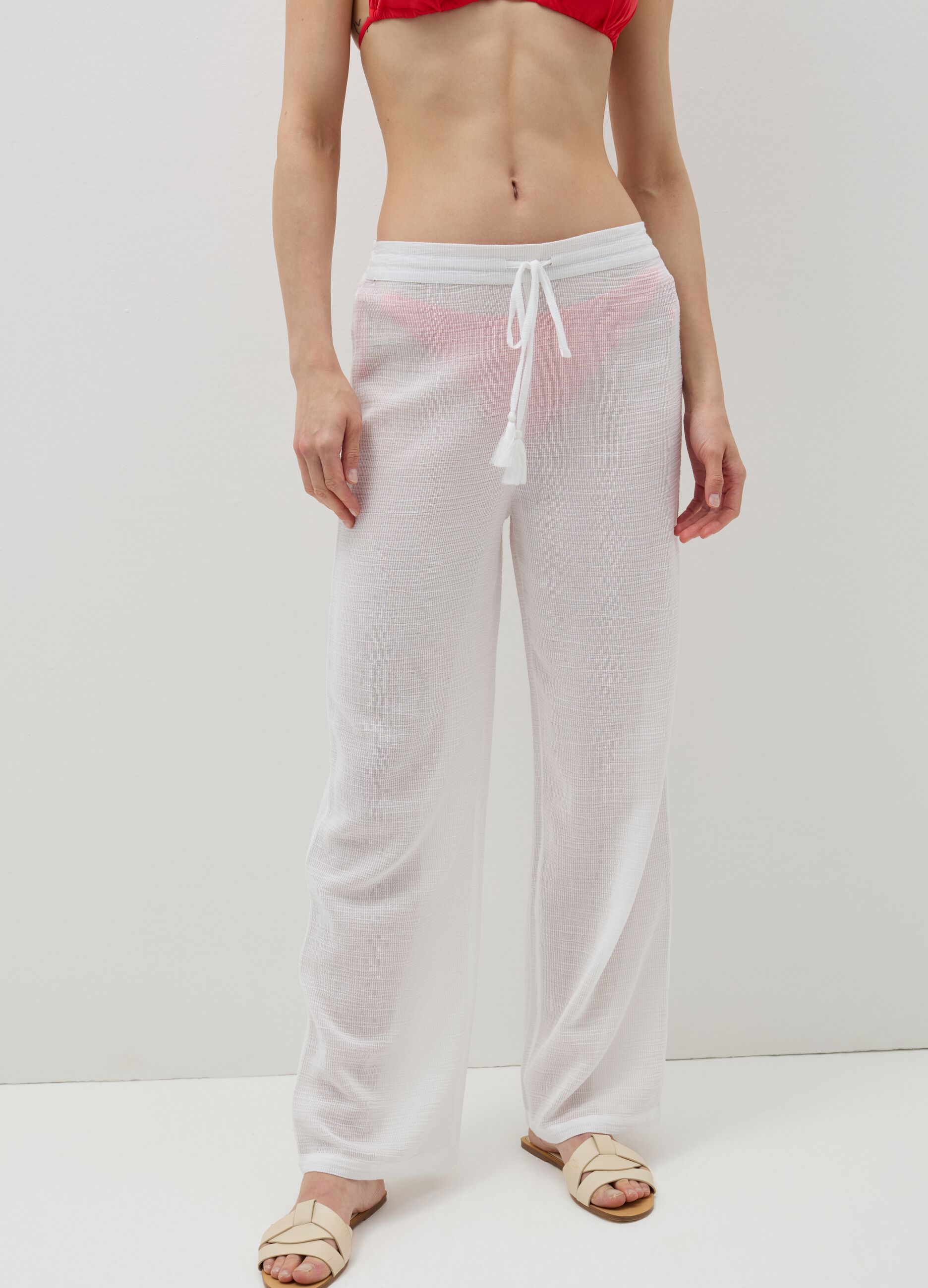 Beach cover-up trousers with tassels