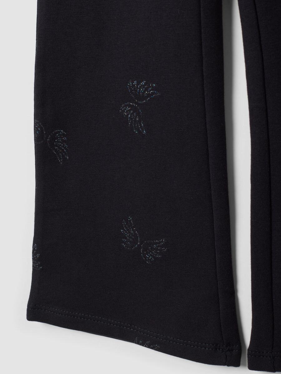 Black flared organic stretch-cotton treggings with glitter wing print_3