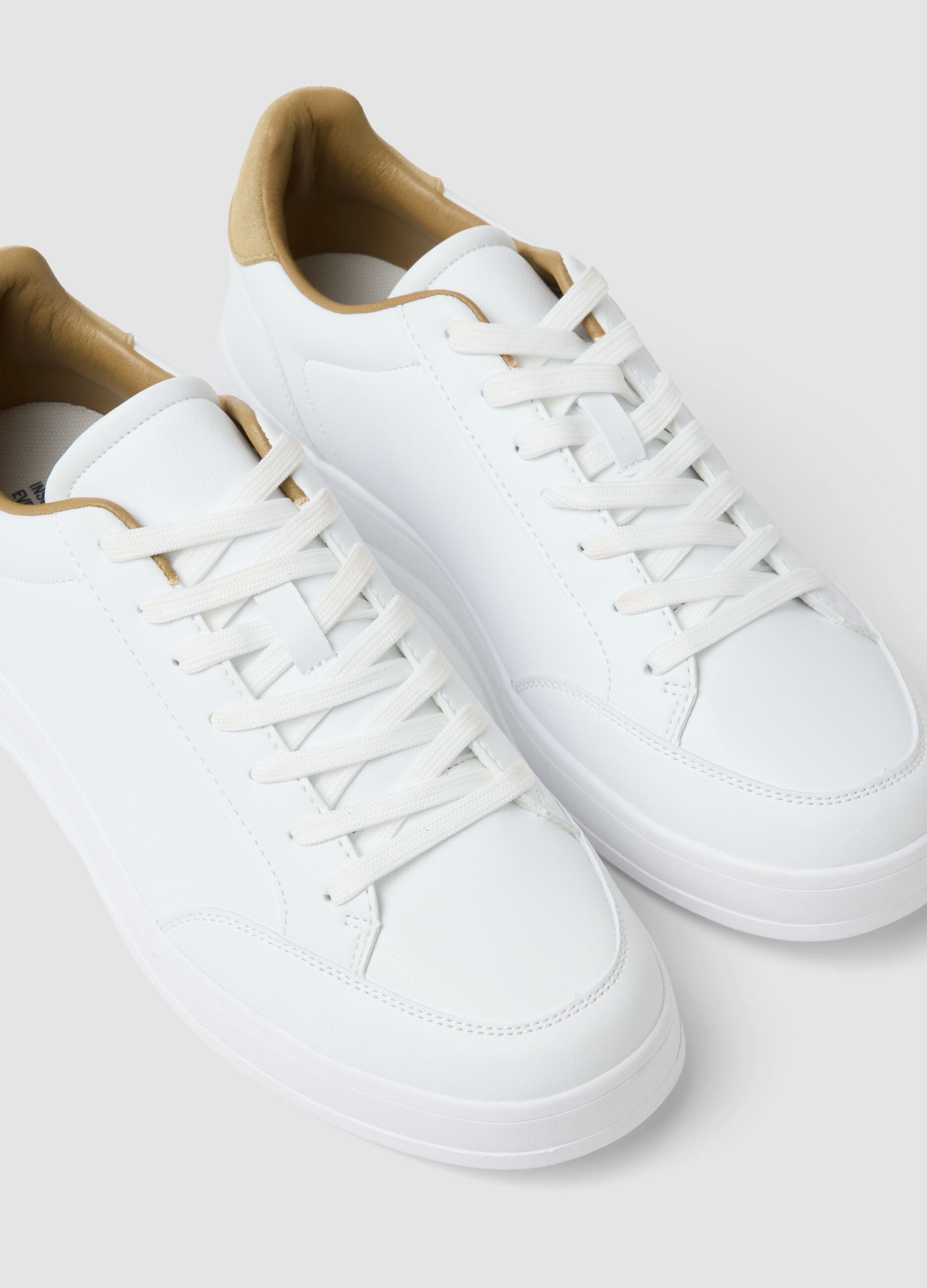 White casual trainers with beige detail
