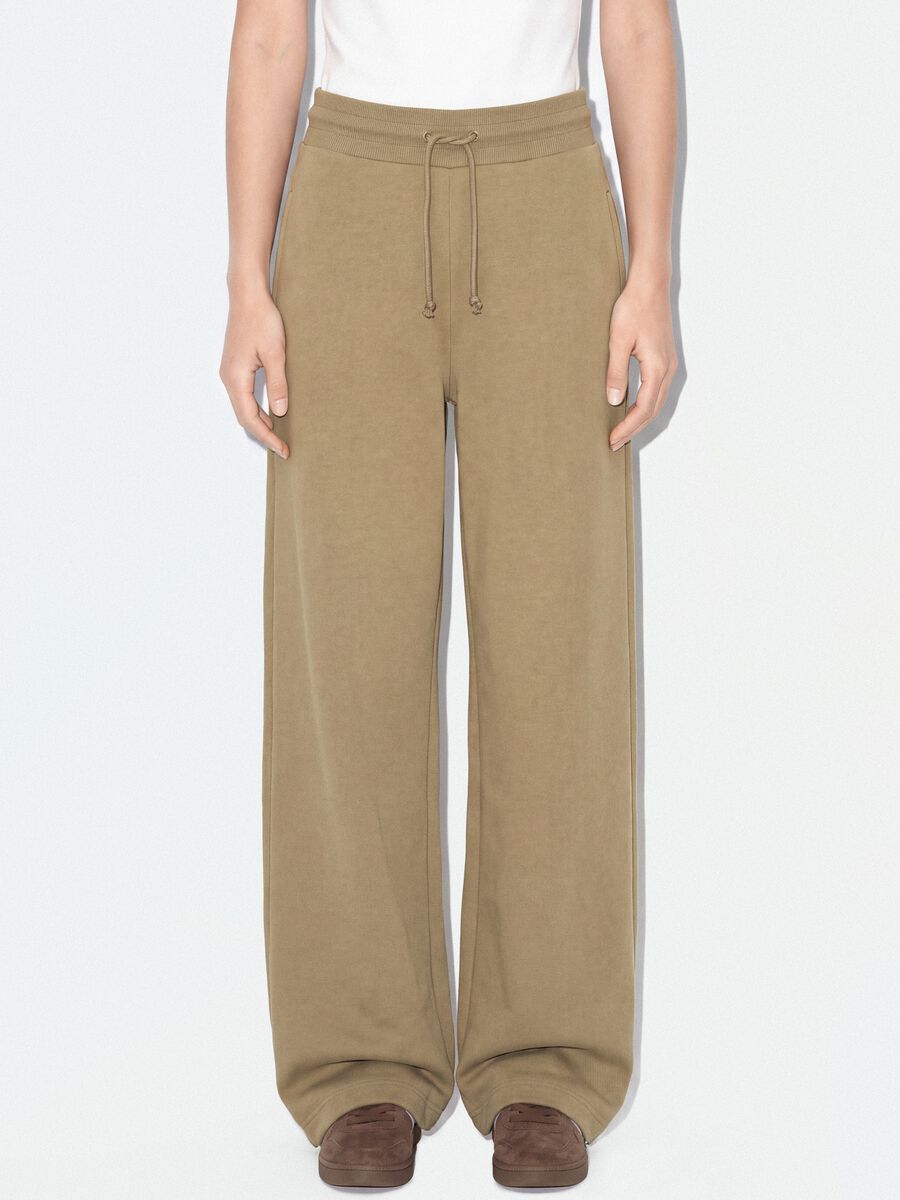 Beige cotton-blend baggy-fit jogger trousers_1