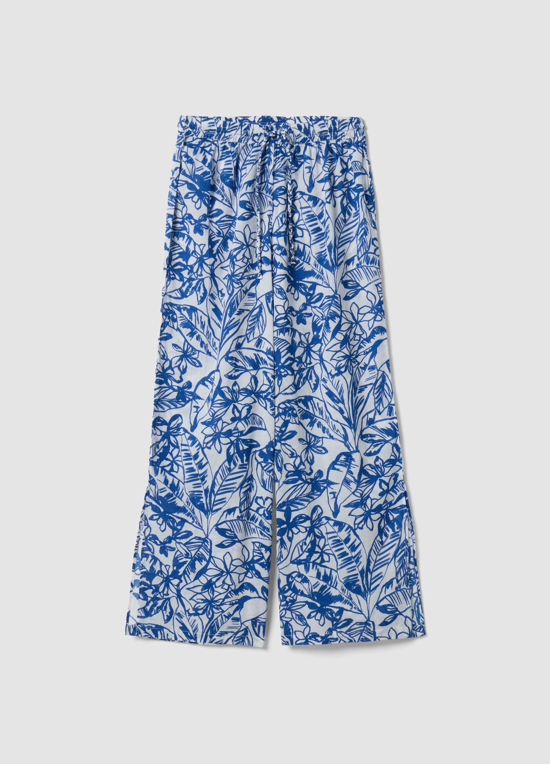 Blue and white organic cotton trousers with floral print