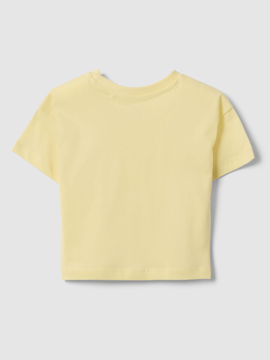 T-shirt in puro cotone giallo da bambina boxy fit con stella_1