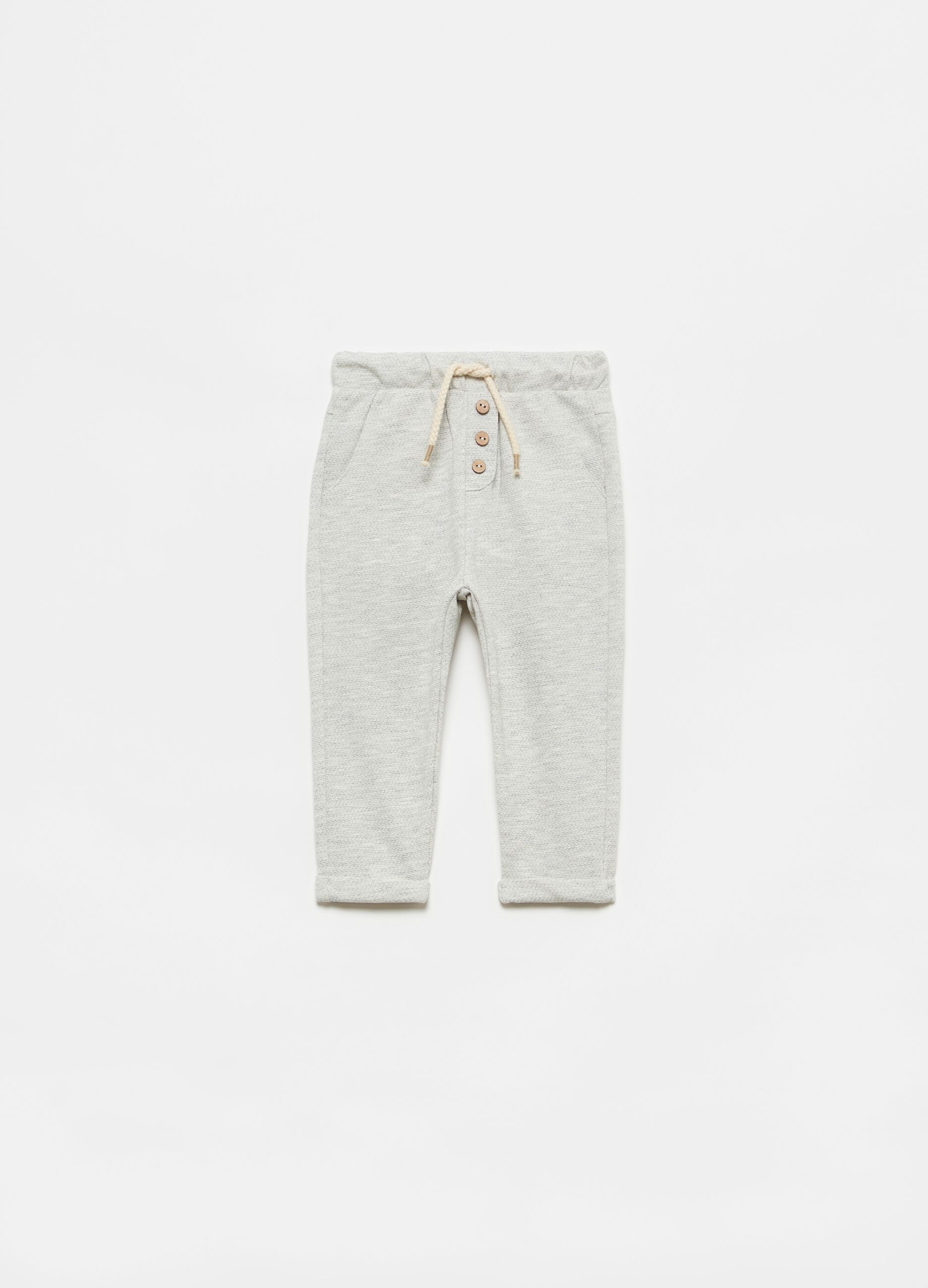 Joggers with drawstring and small buttons