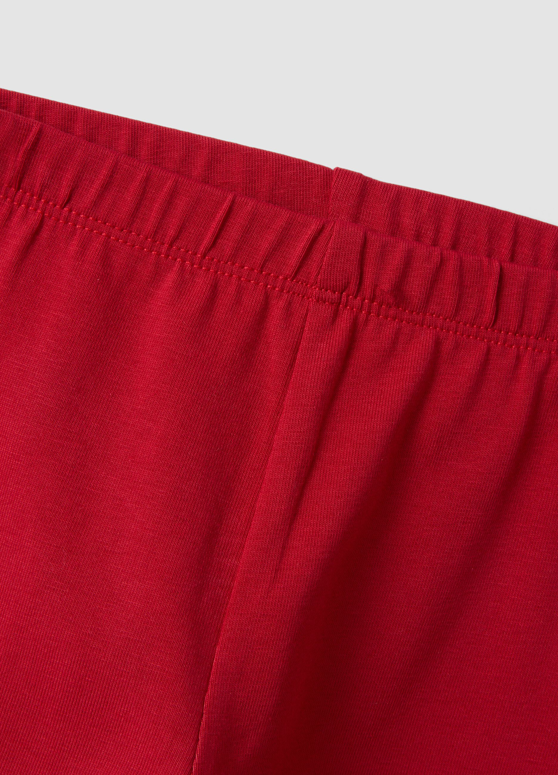 Red stretch organic cotton leggings with bow details for baby girl