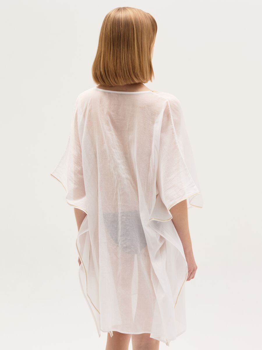 Beach cover-up poncho with lurex edging_2