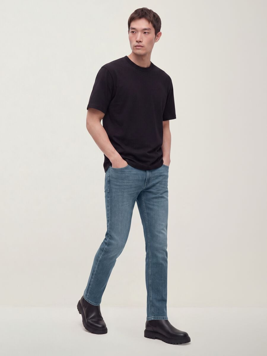 Mid-wash slim-fit stretch cotton jeans_0