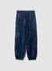 Blue oversized pure cotton all-over print jogger trousers for boys_0