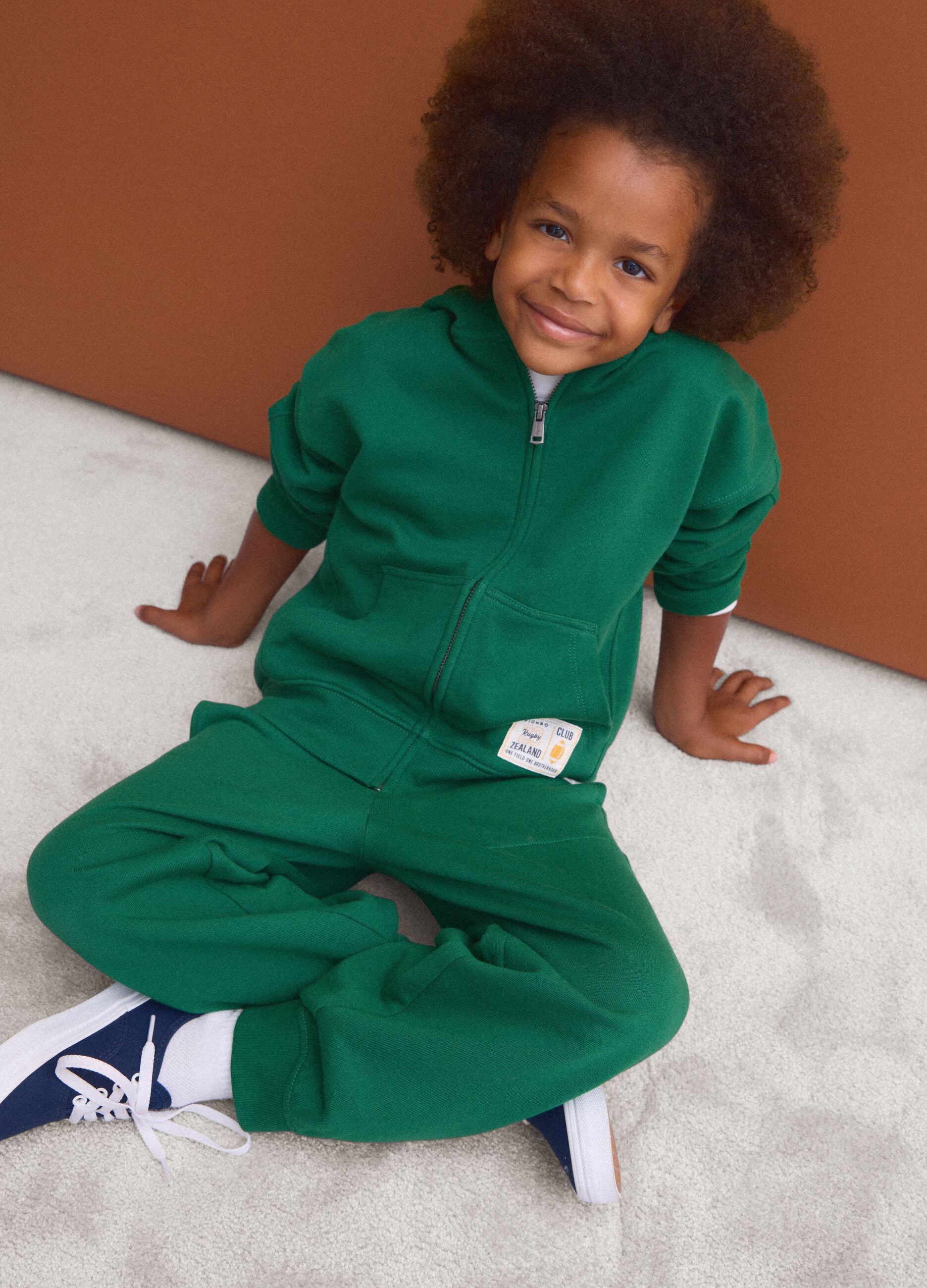 Green pure cotton jogger trousers with elasticated waist for boys
