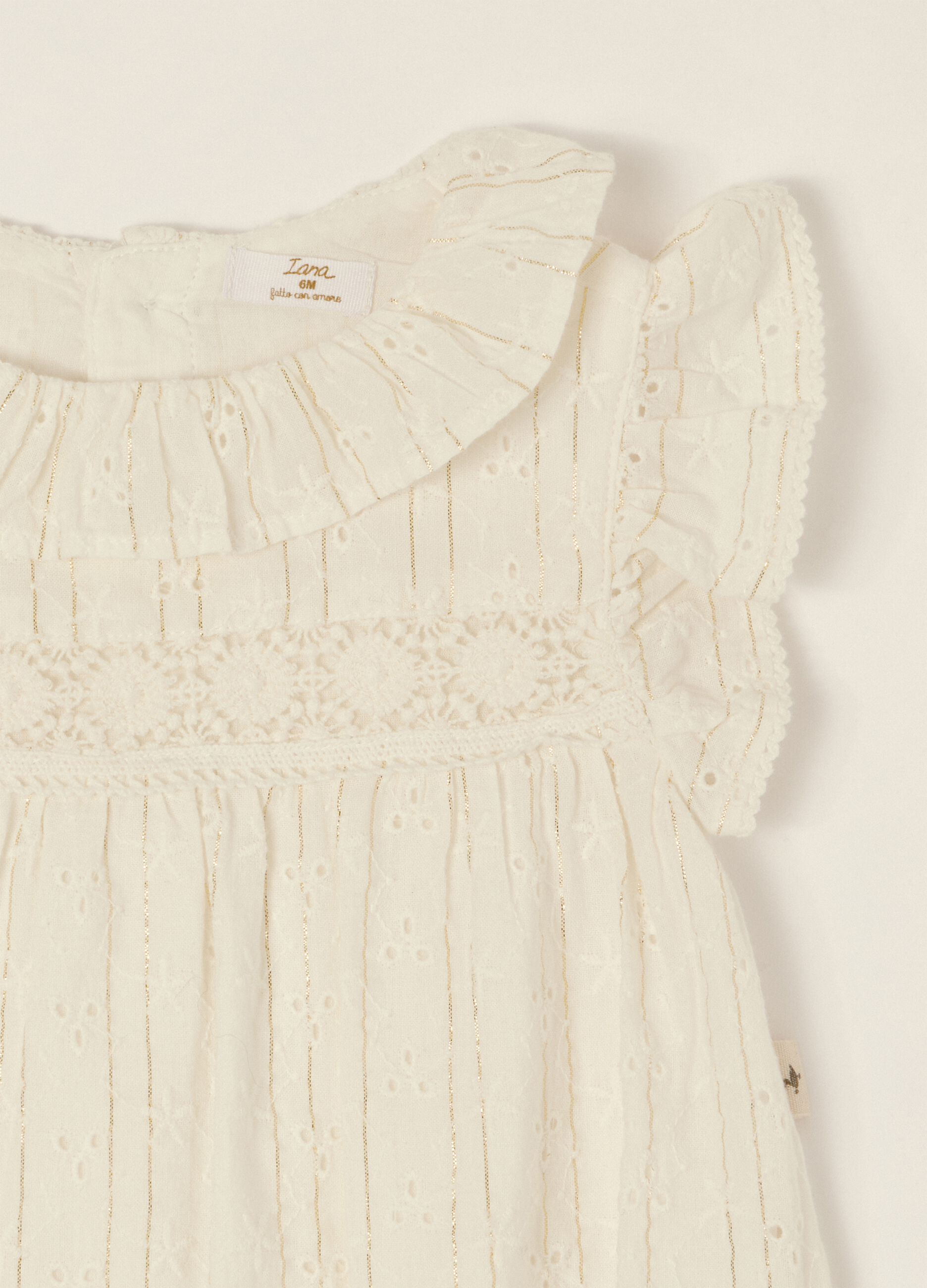 White cotton-blend baby girl sleepsuit with classic collar