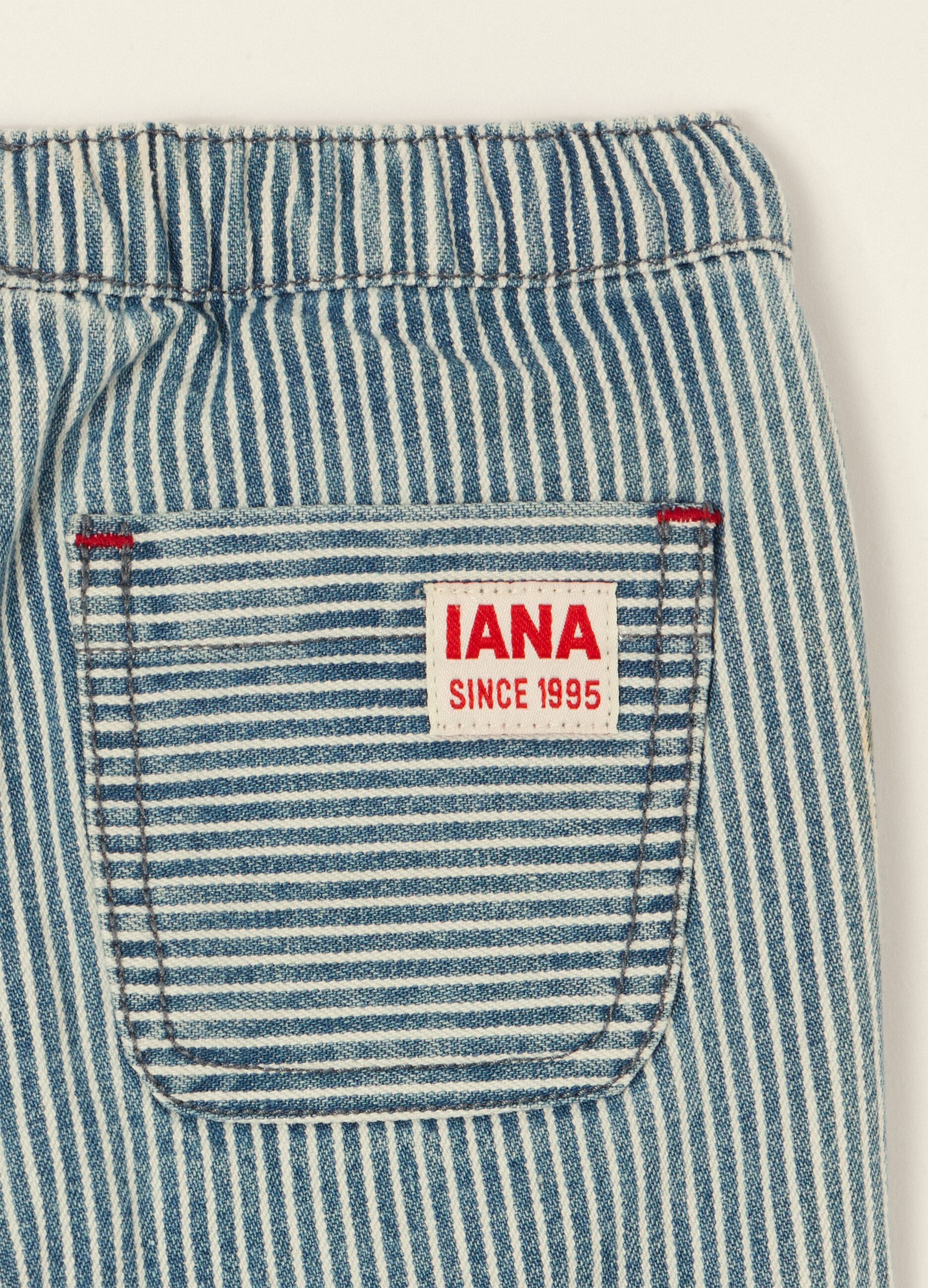 Striped baby trousers in a cotton, viscose and lyocell blend, regular fit