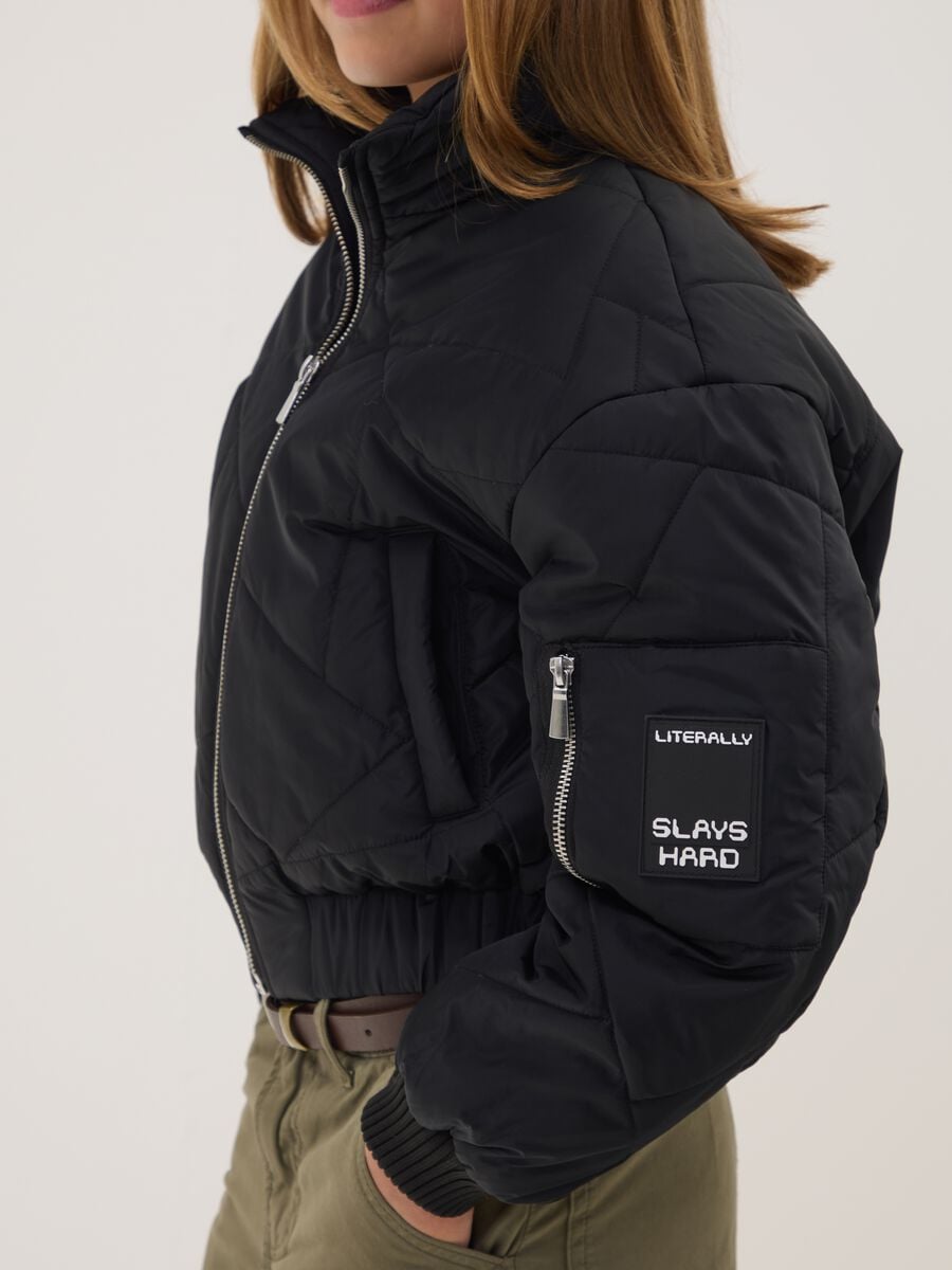 Black padded jacket with zip and high neck_1