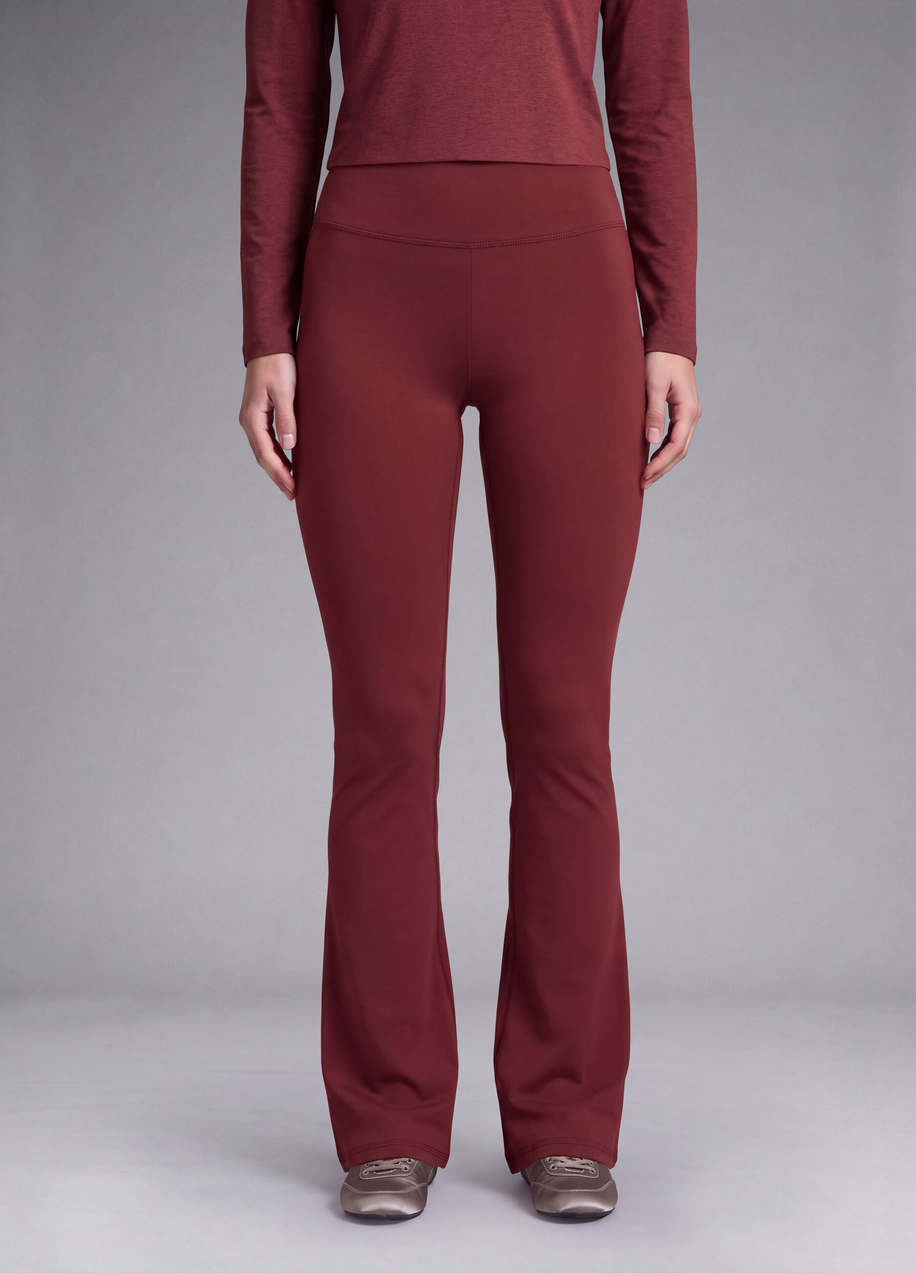 Red flared leggings in stretch fabric