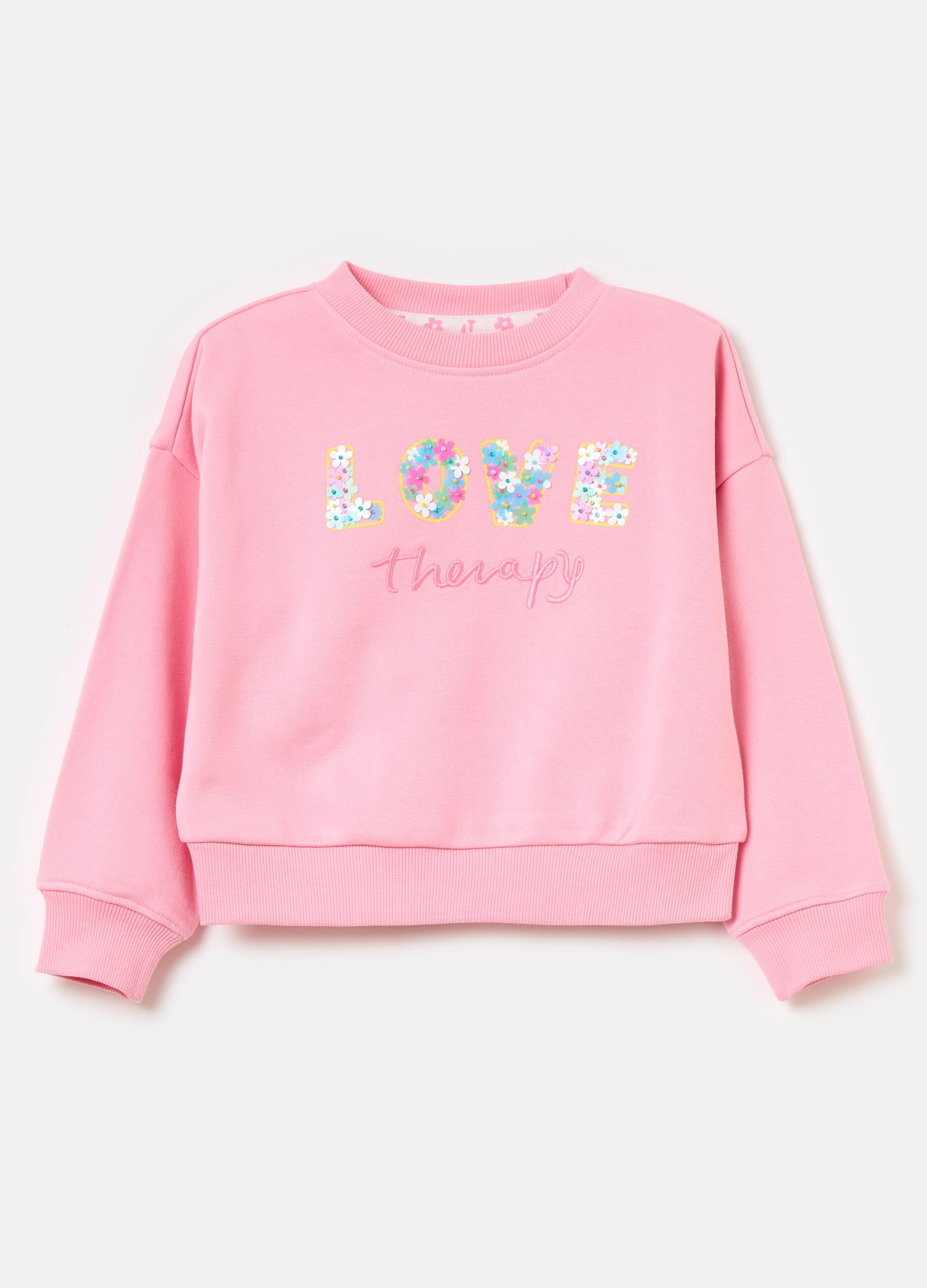 Sweatshirt in French terry with small flowers application