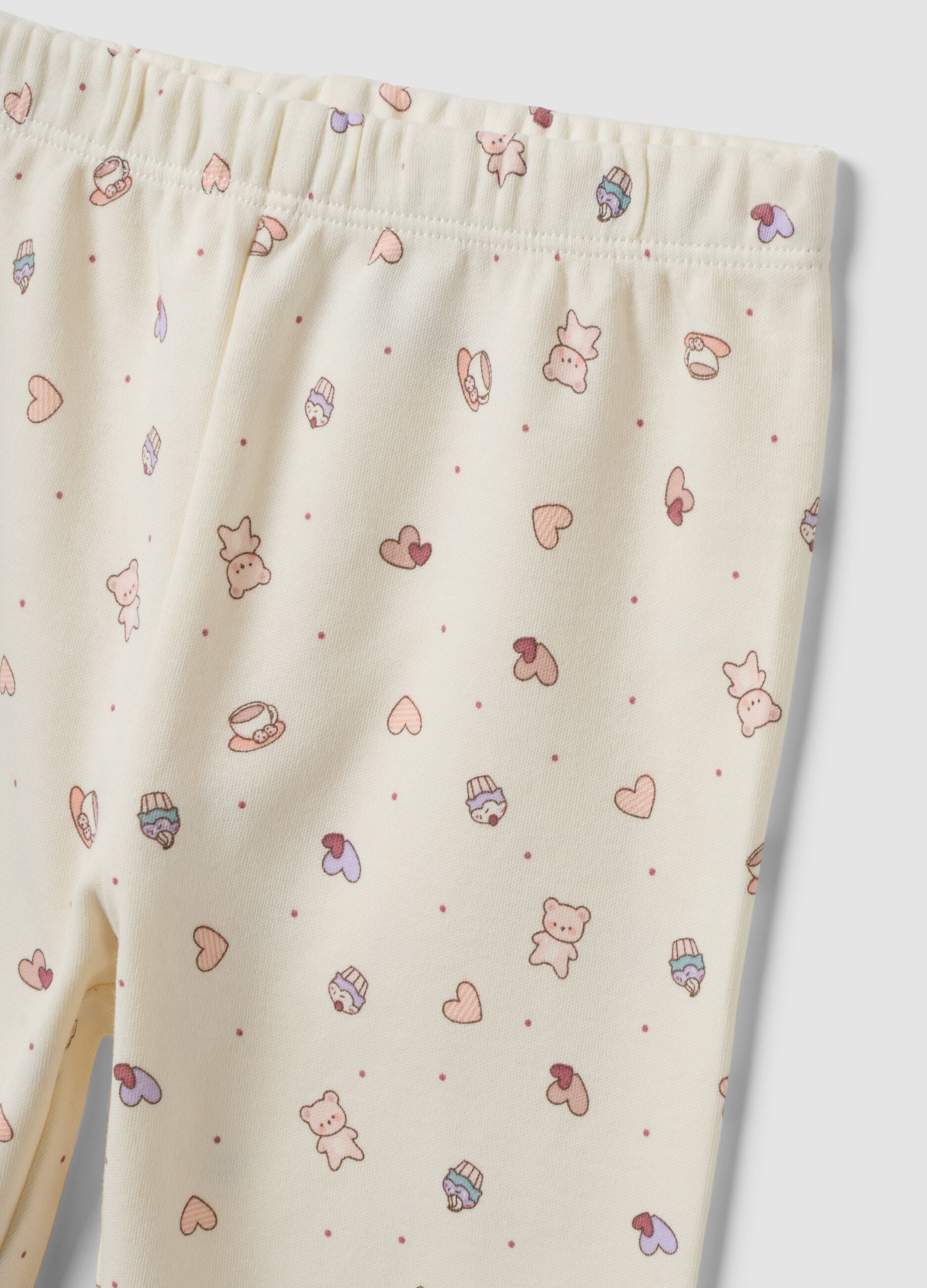 White organic cotton pyjamas with hearts and teddy bear print for baby girl