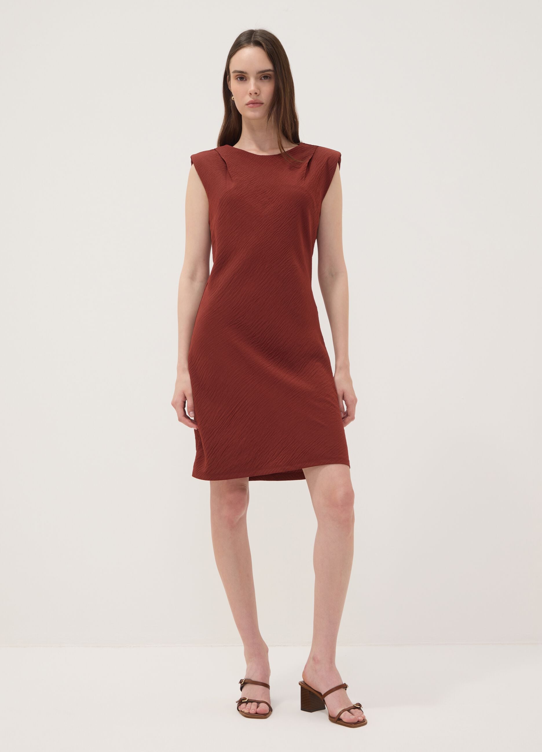 Red fitted dress with ruched detailing
