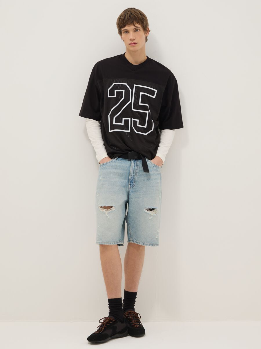 Blaue Denim-Shorts im Skater-Fit aus reiner Baumwolle mit Rissen_0