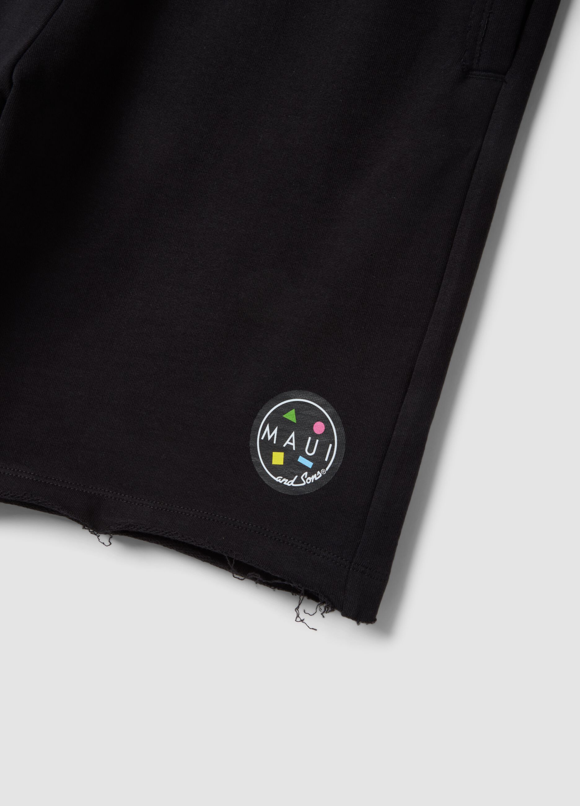 Black pure cotton relaxed-fit Bermuda shorts with raw-cut hems