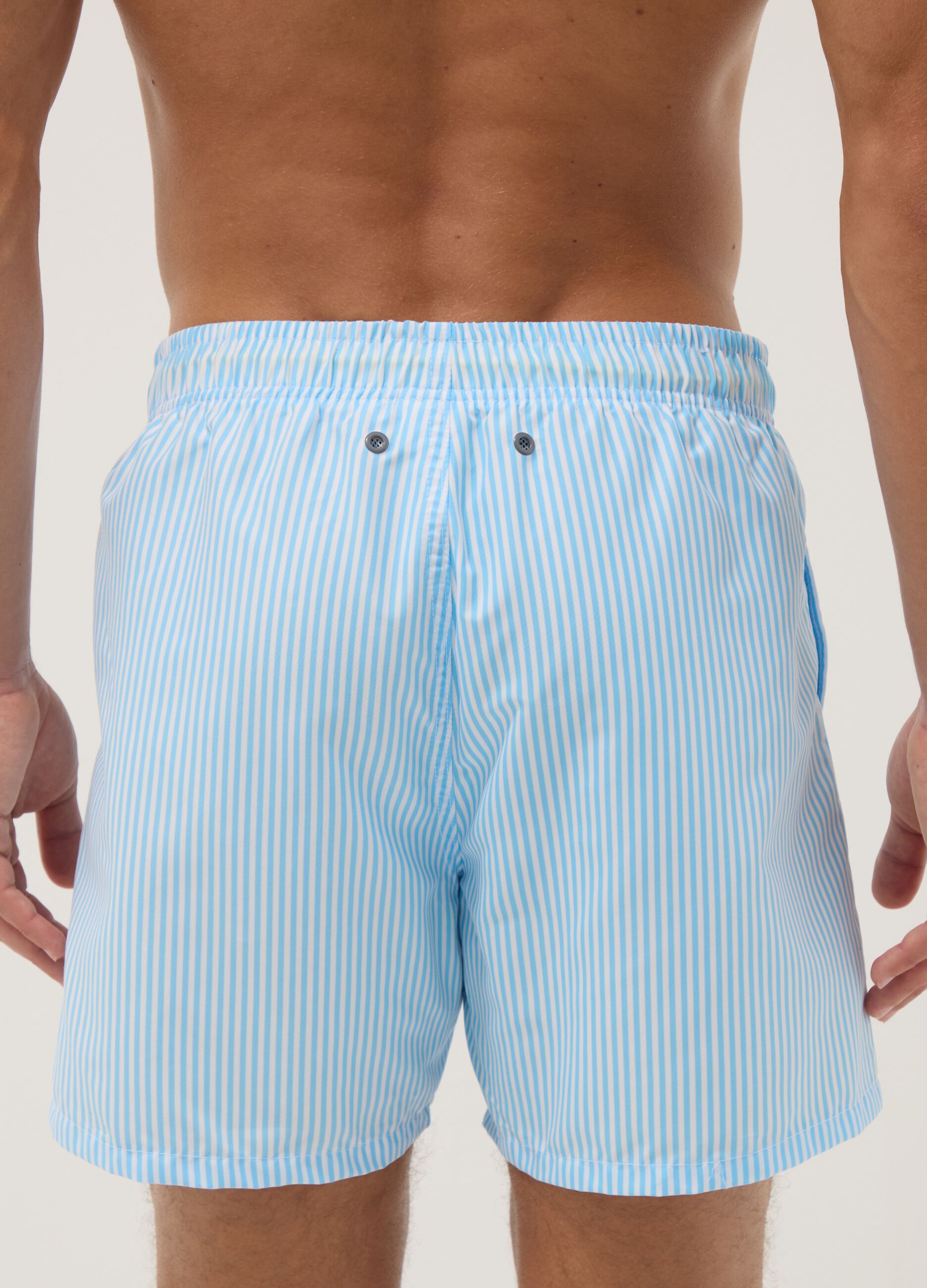 Blue and white striped swim boxers with Donald Duck print