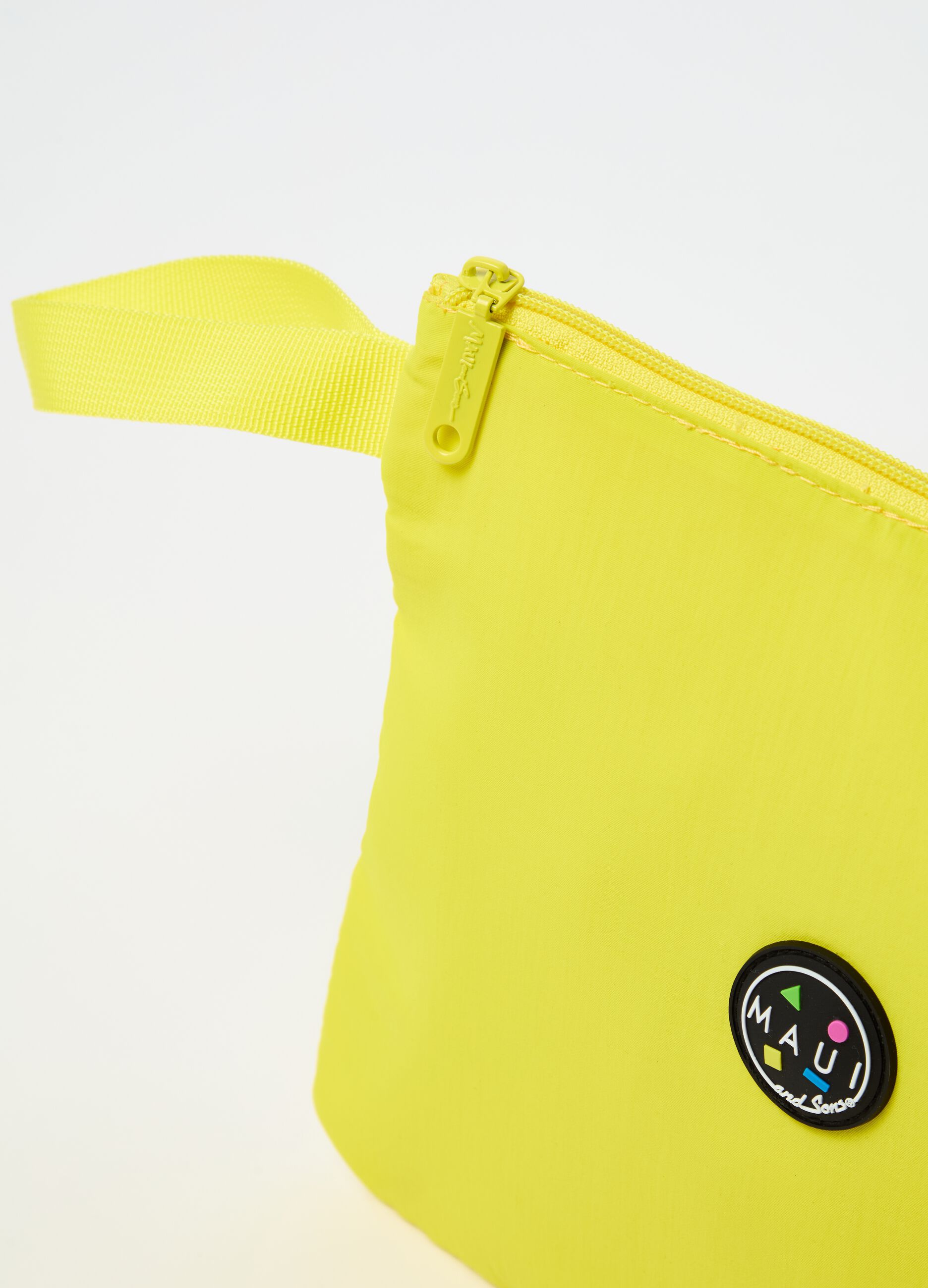Solid colour clutch bag with logo patch