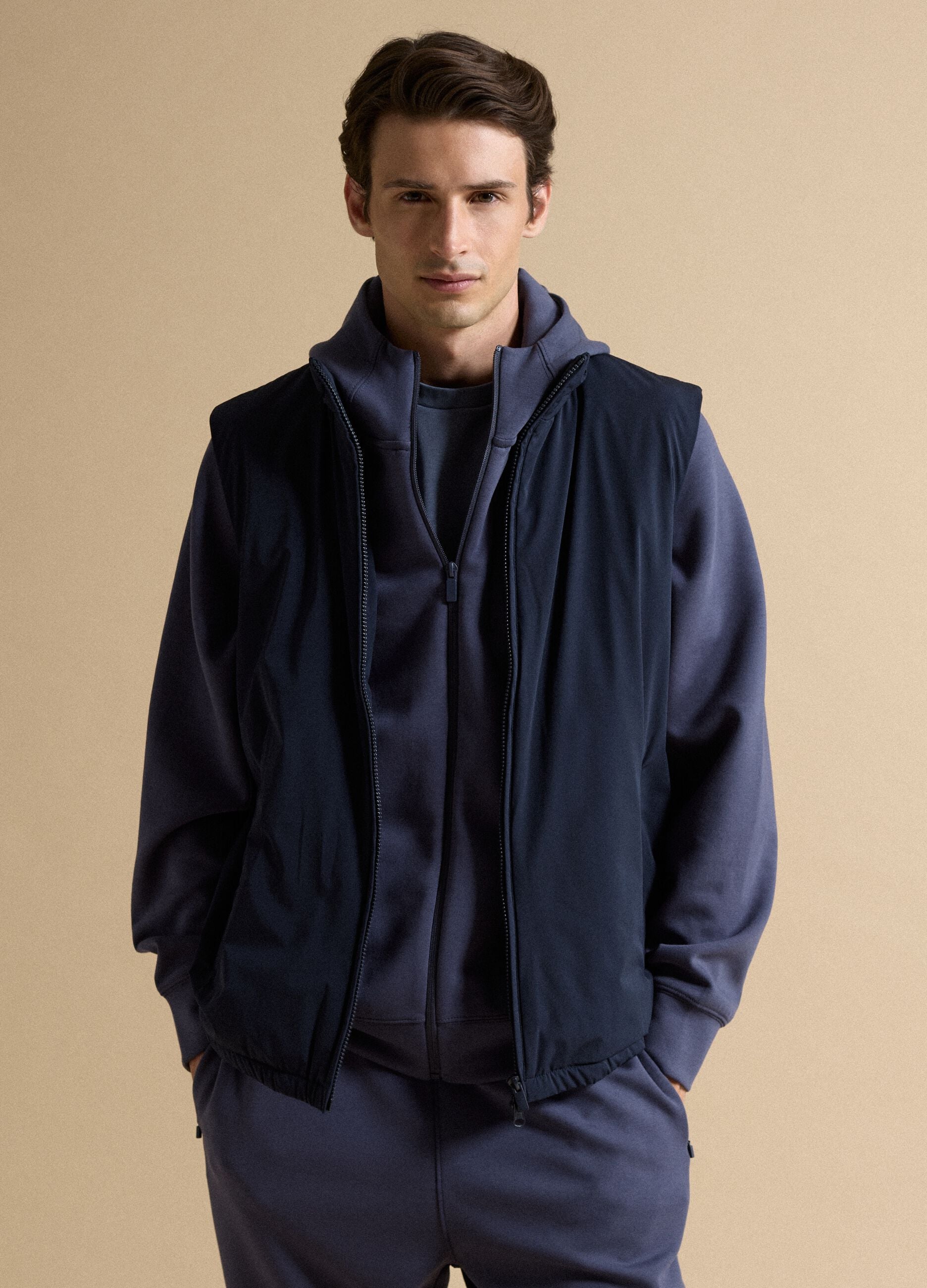 Blue stretch-fabric gilet with zip