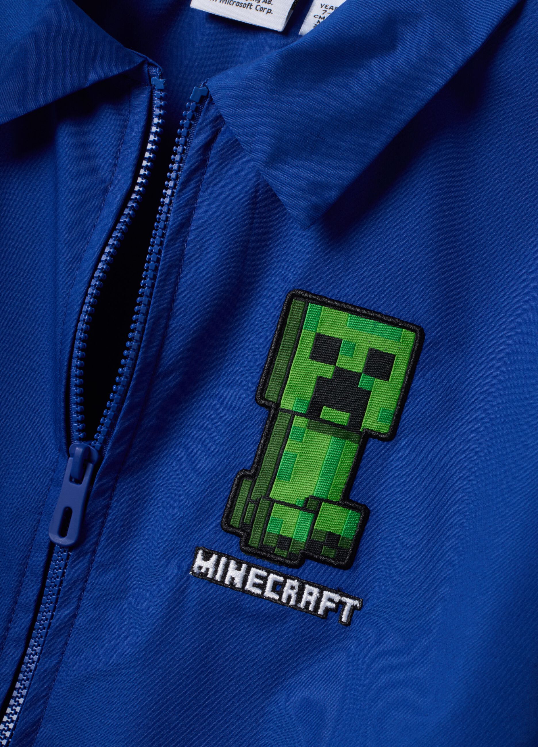 Blue school apron with Minecraft embroidery for boys