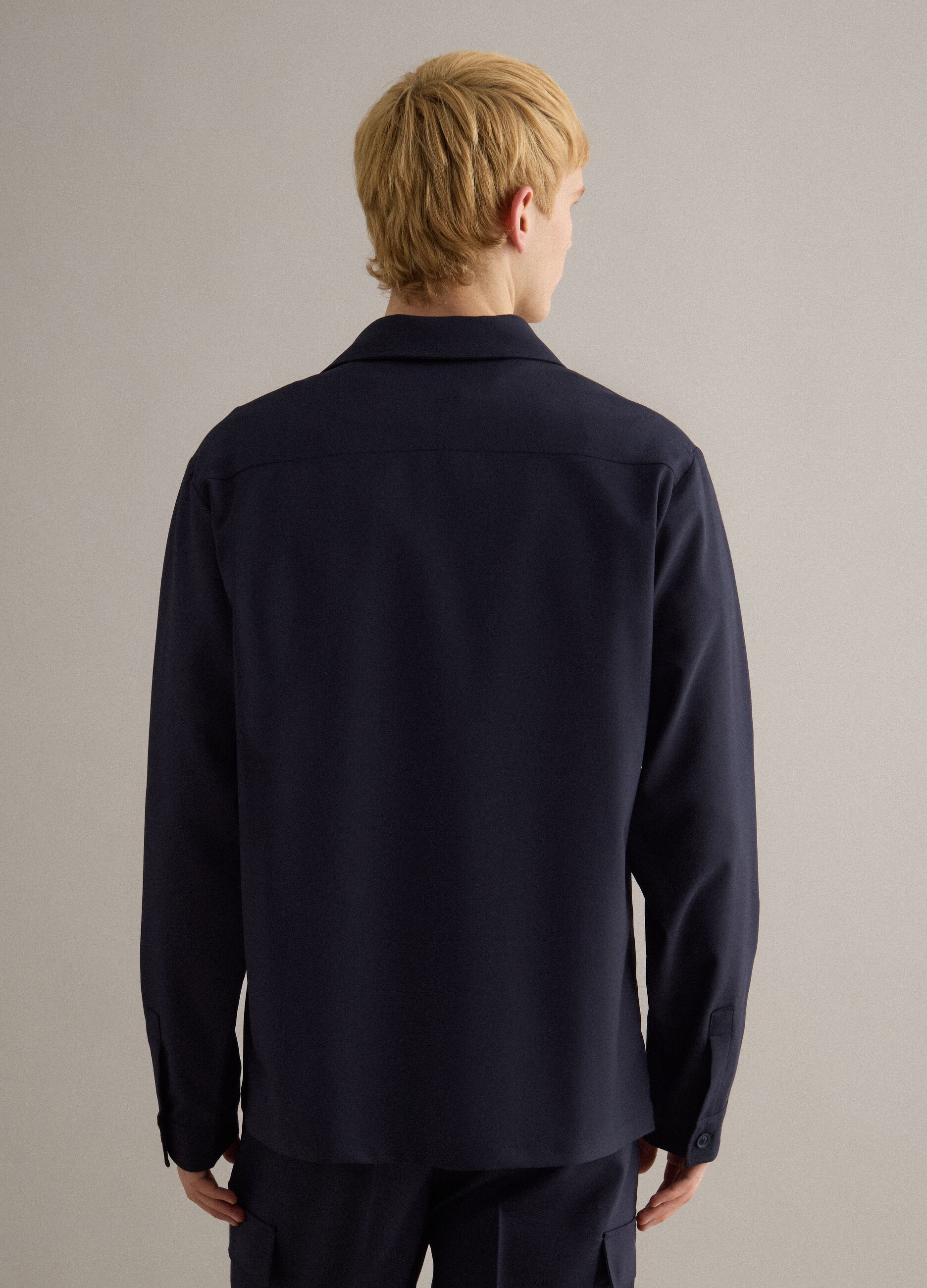 Light blue regular fit jacket with buttons and front pockets